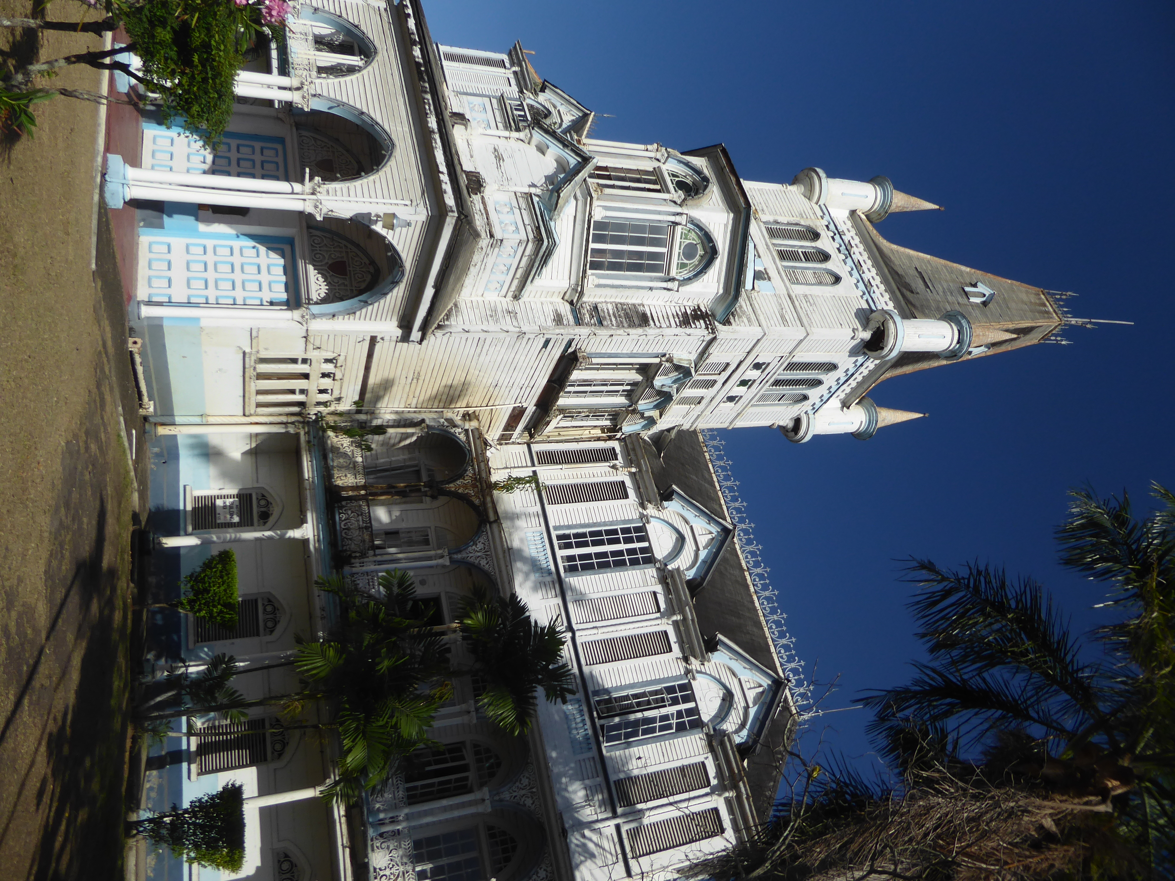 Guppy calls the city hall "a weatherboard and cast-iron Rhenish castle." The designer was the same Ignatius Scoles who called the law courts