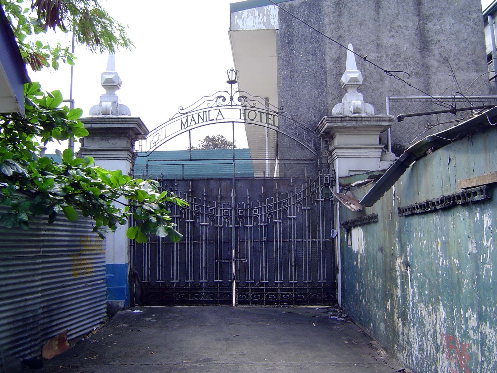 The hotel has slipped into a long decline, but this side gate hints at its former elegance. Characteristically, Burnham wrote that he did "n