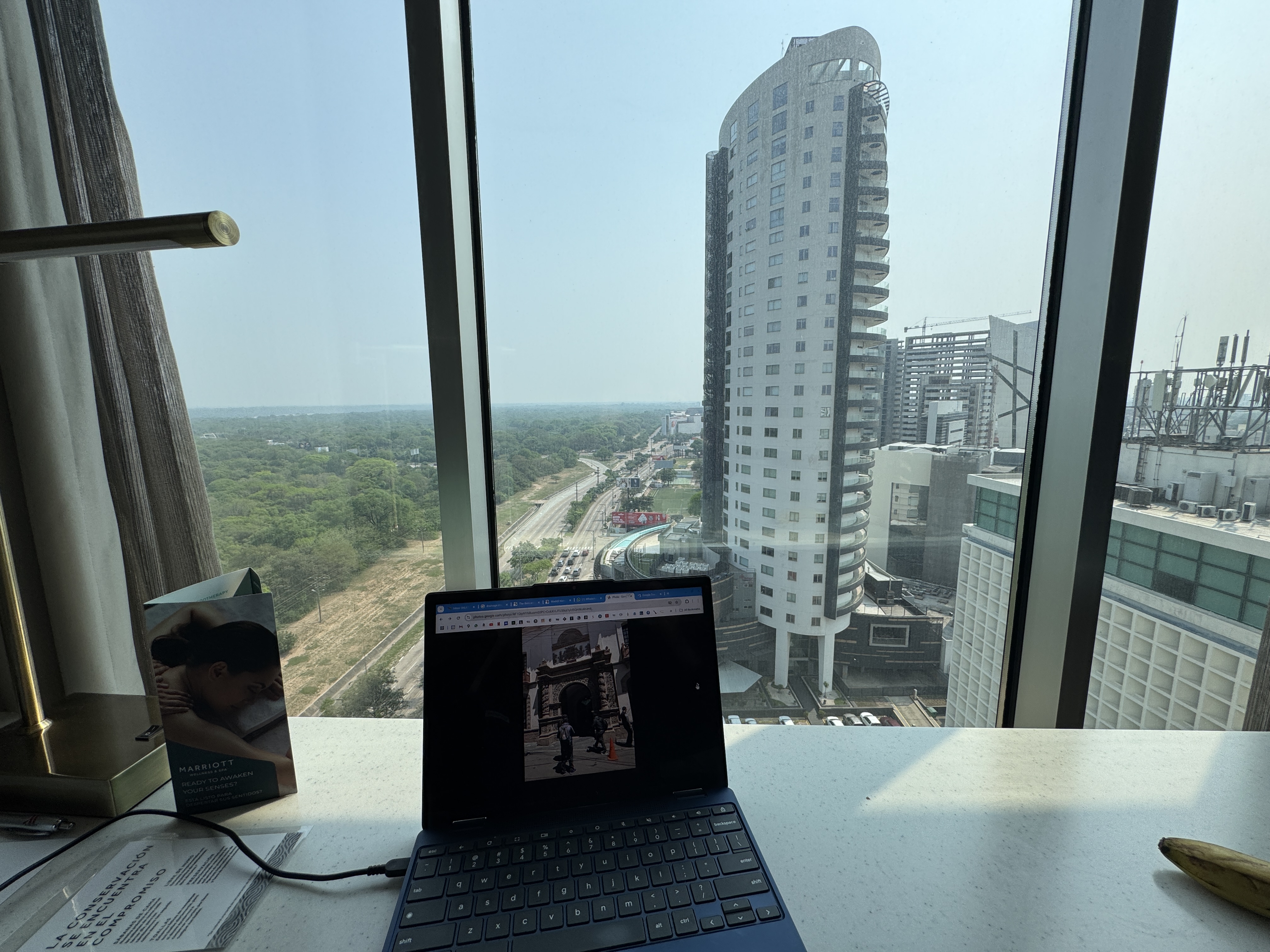View from a hotel window.  There's an exciting contrast between the city and the endless forest.  Also, that ring road named simply Cuarto A