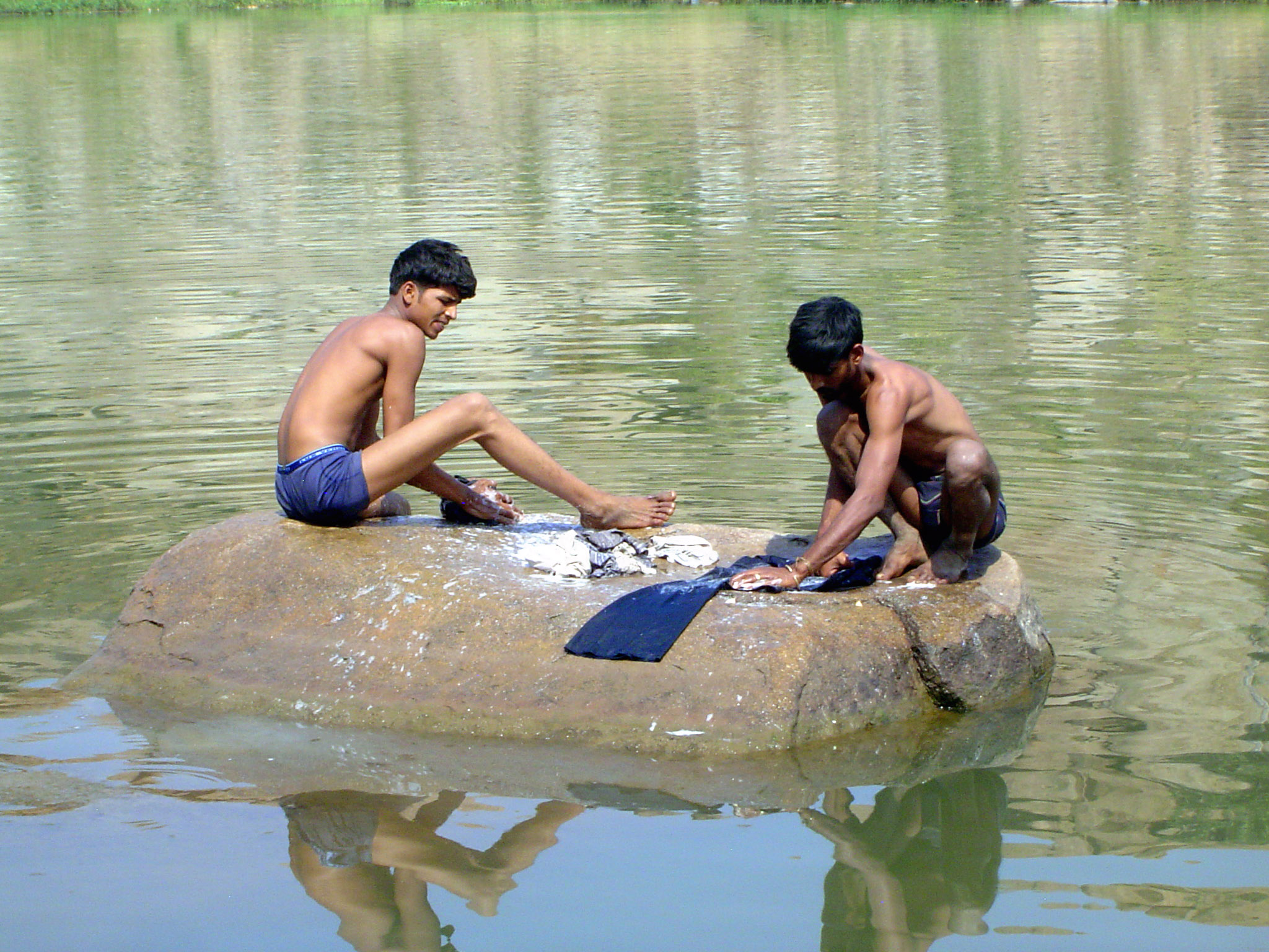The rocks make excellent washboards. Someday, pants will come in any color you want, so long as its blue.