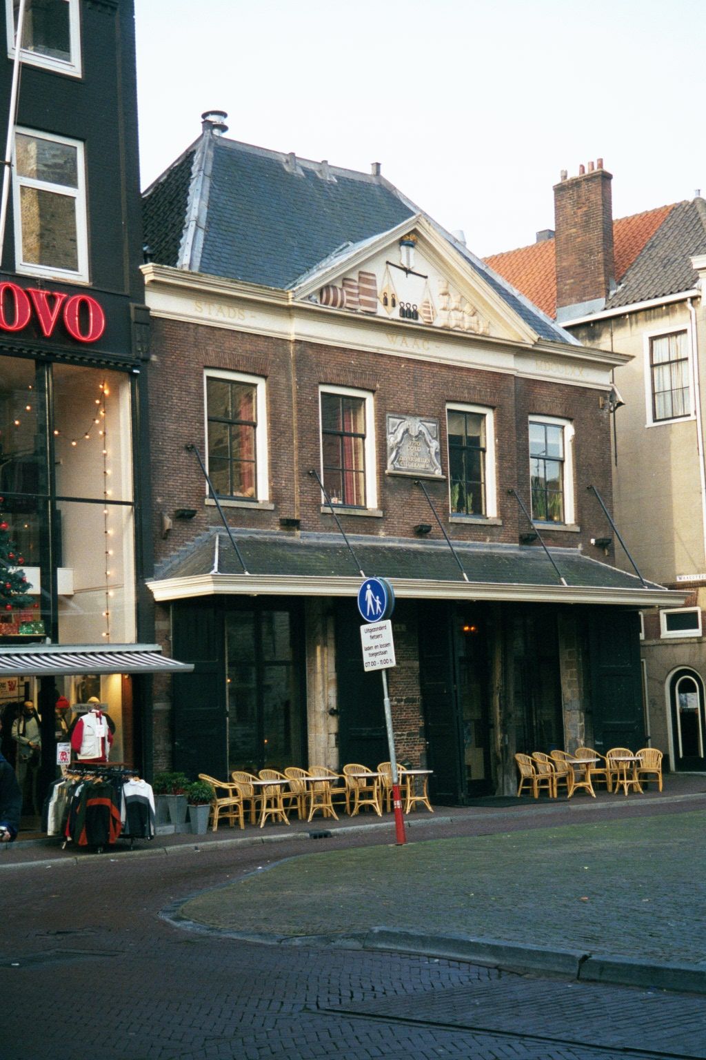 Immediately east of the Stadhuis is De Waag, now a restaurant. Any idea about its original purpose? Hint: the other side of the building fro