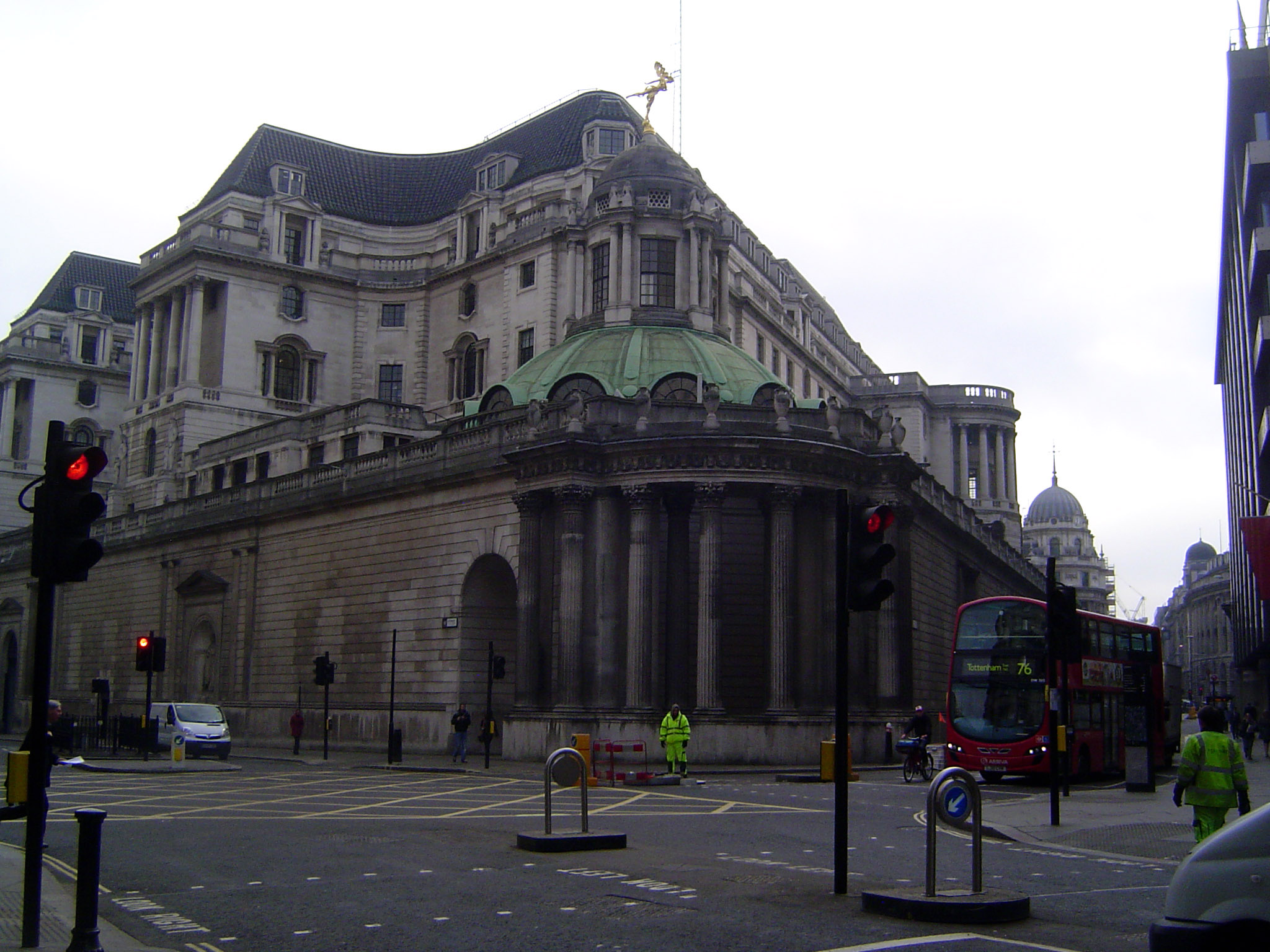 We've jumped to the Bank of England, safe behind John Soane's perimeter wall, a "grooved cliff of Portland stone" 1: 275. In the 1920s and 3