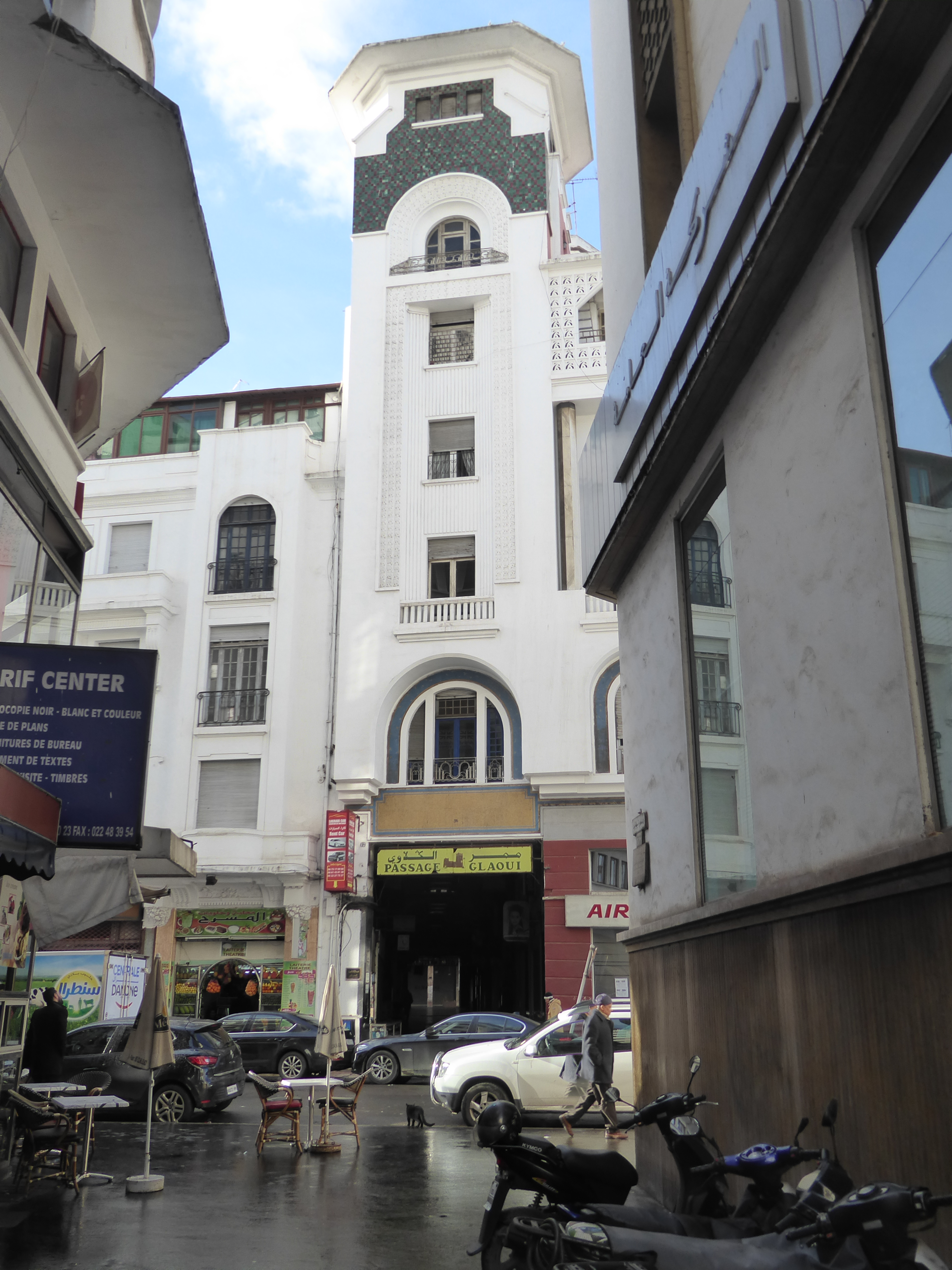 It marks the entrance to an arcade.