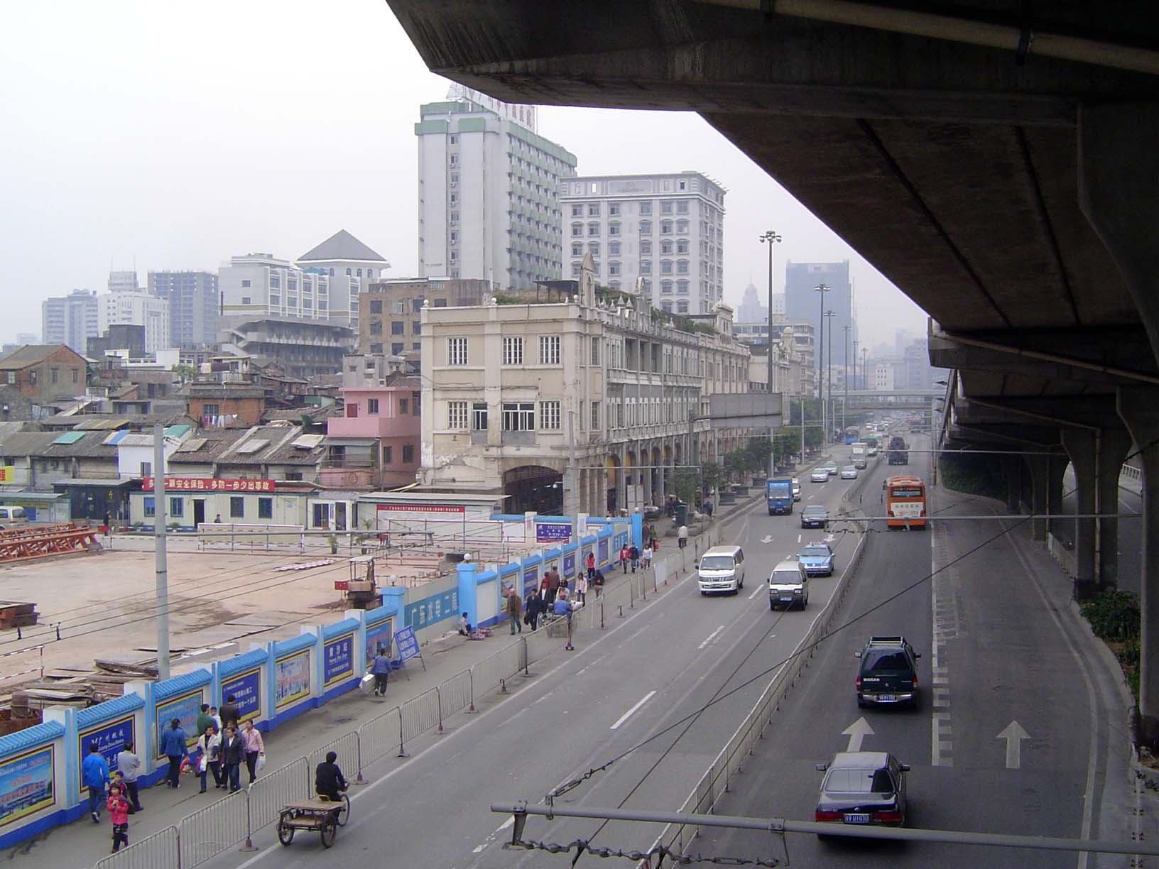 Directly across the street from the island, there's a thin line of shops that once catered to Shamian residents; behind it, there's the old