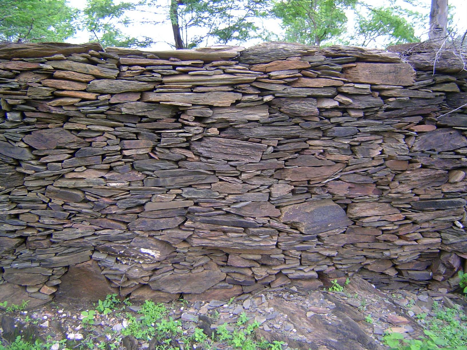 The countryside is laced with miles and miles of dry-course stone walls.