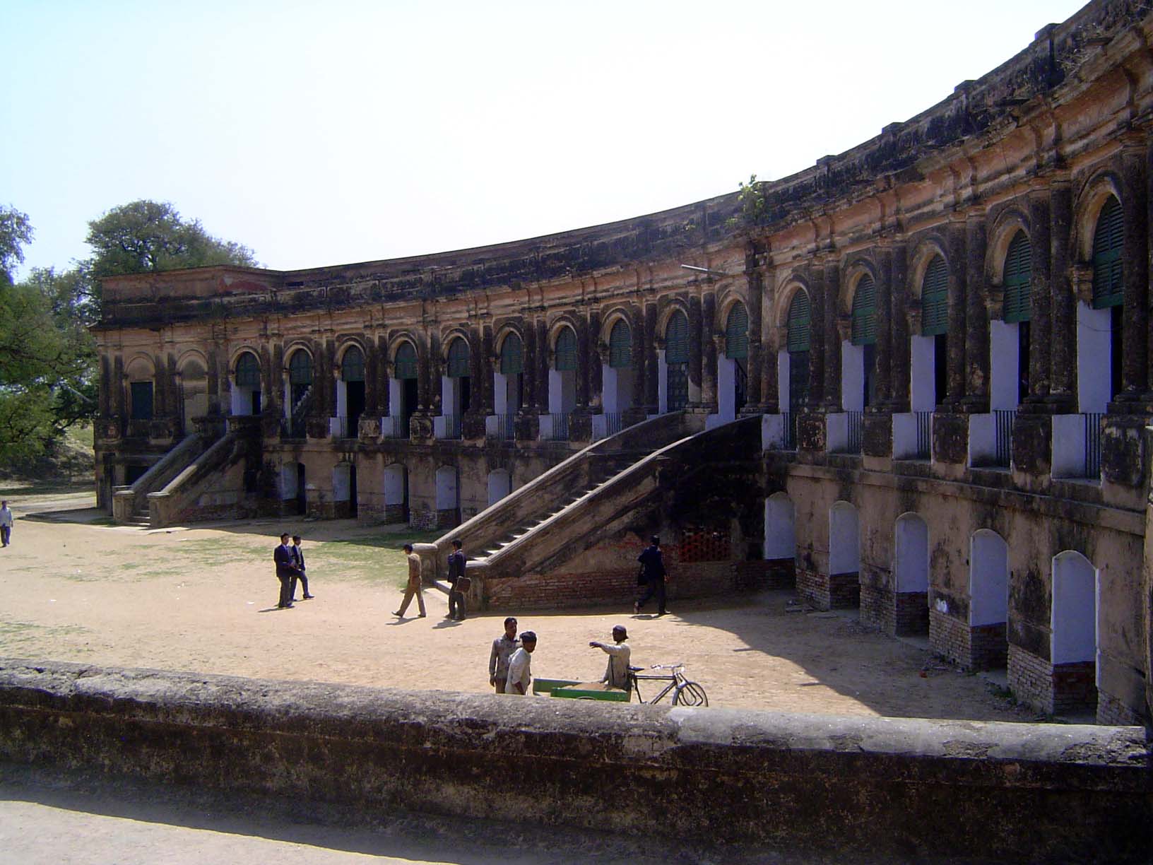 The central portion of the building was completed in 1796; the classroom wings were added 40-odd years later, when the school opened. Decade