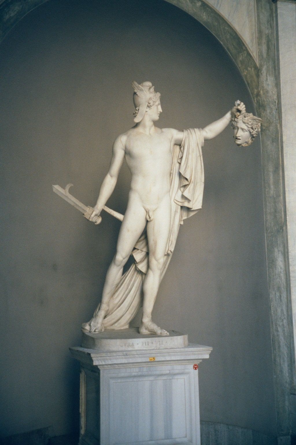 Perseus stands a few feet away in the Octagonal Courtyard of the Vatican's Belvedere. The statue is by Canova 1757-1822, some 16 centuries a