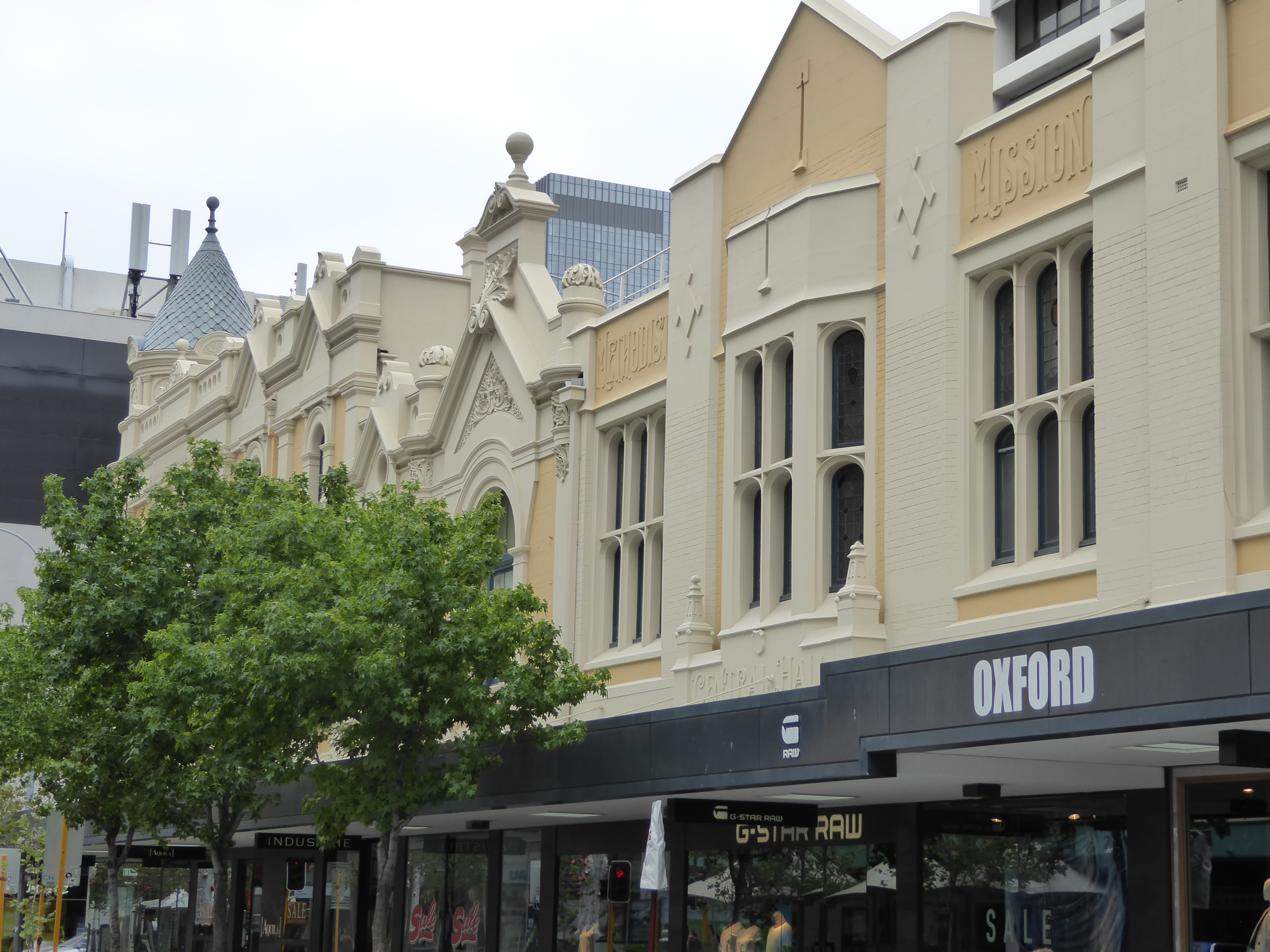 Down a peg to an Australian chain of clothing stores. Go back a century, and this was the Central Hall of the Methodist Mission.