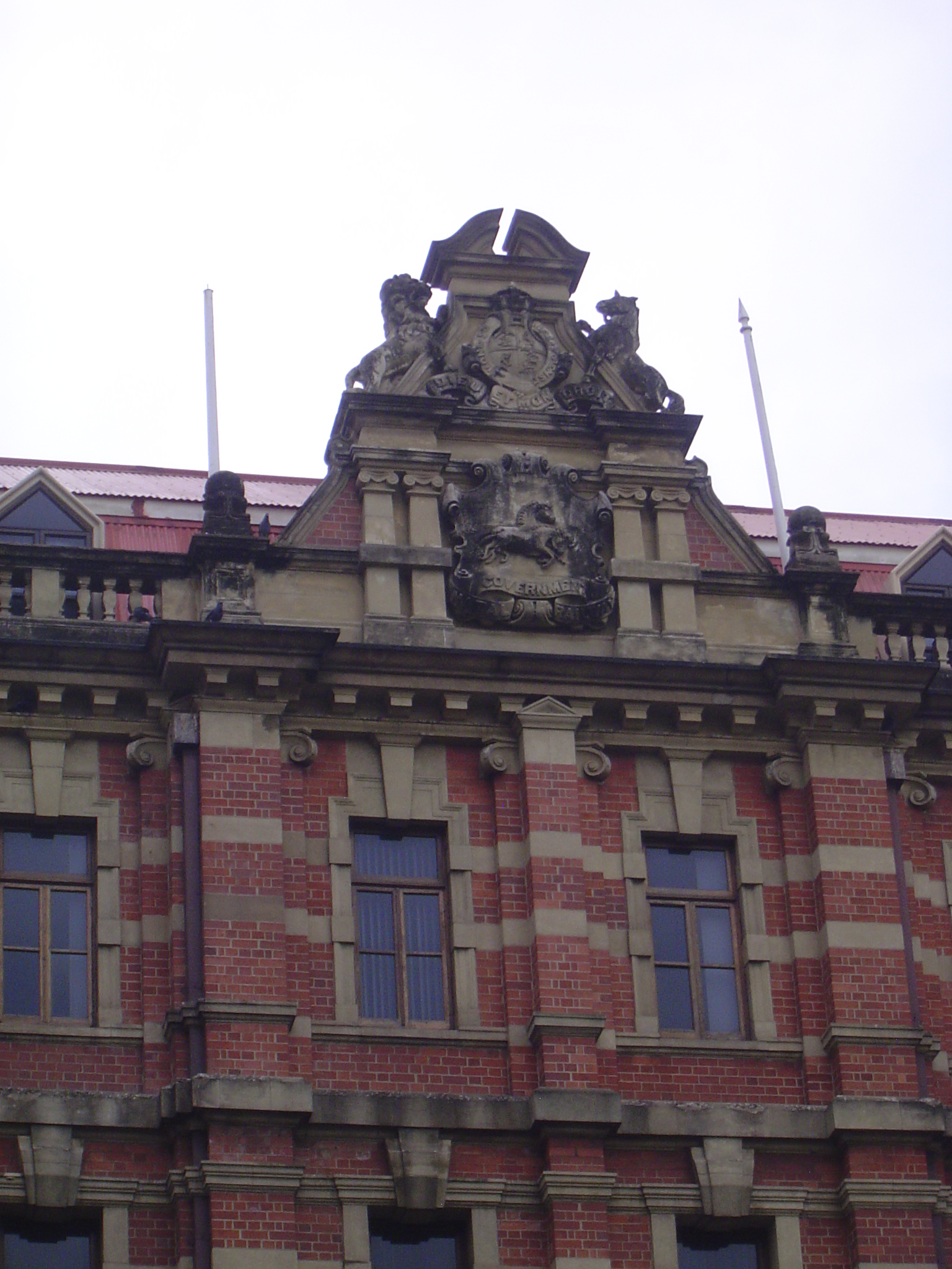 The British royal arms are up top; just below them is the Natal version, with two galloping wildebeest.