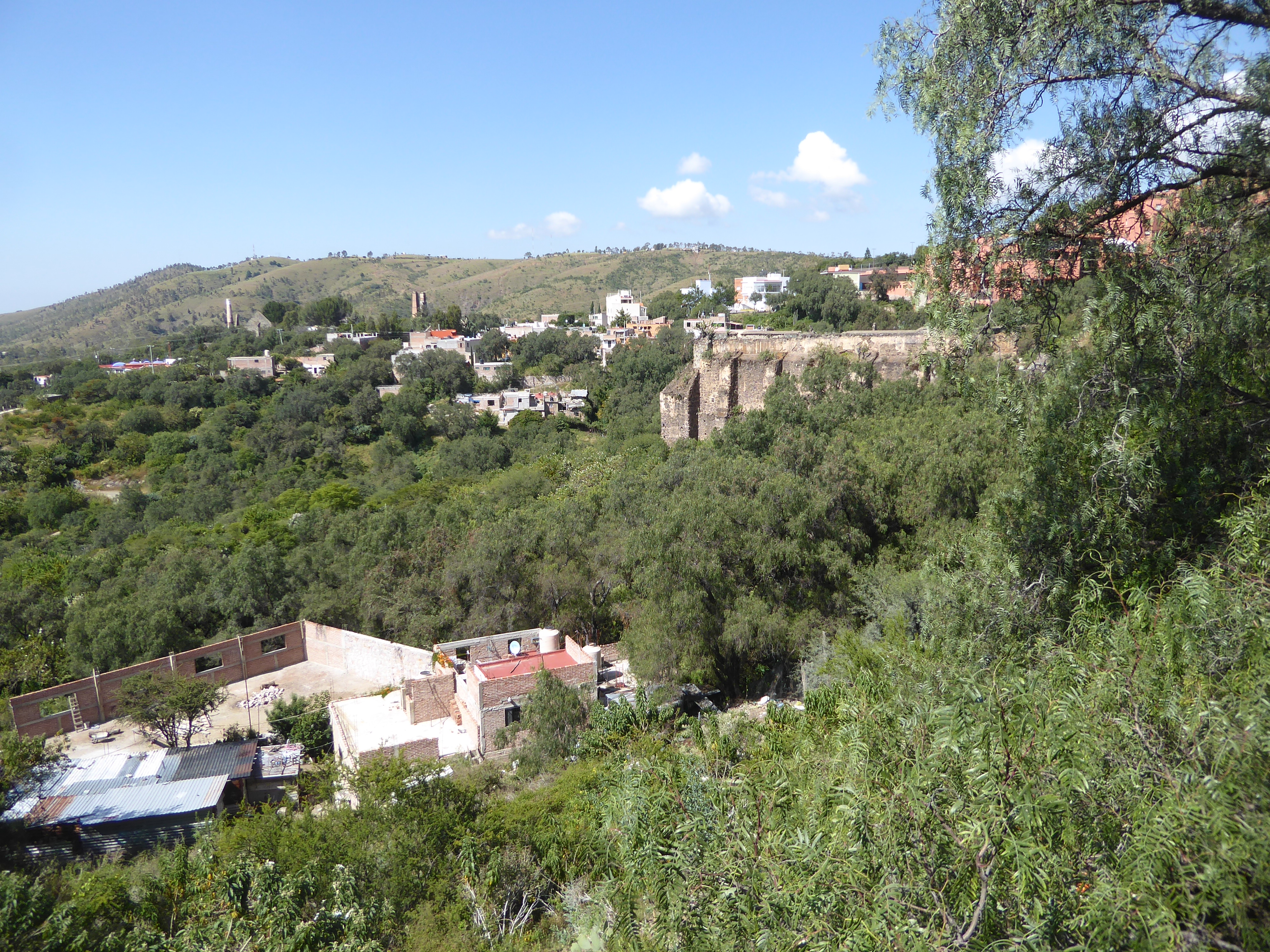 Obragón built a house for himself near this vantage point, which looks over to the El Tiro shaft in the distance. You can make out twin stac