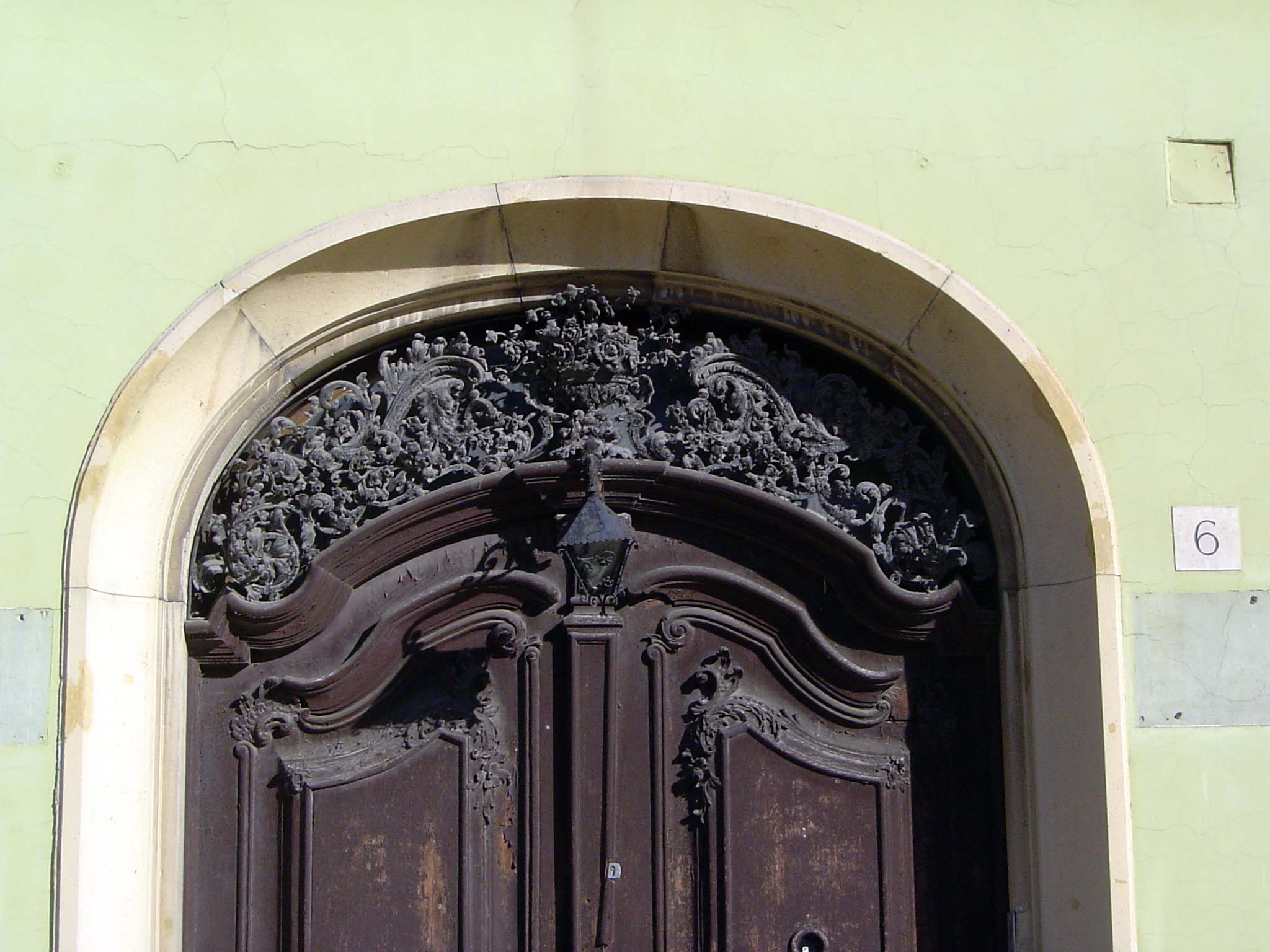 Relatively, because ornament is not wholly suppressed.