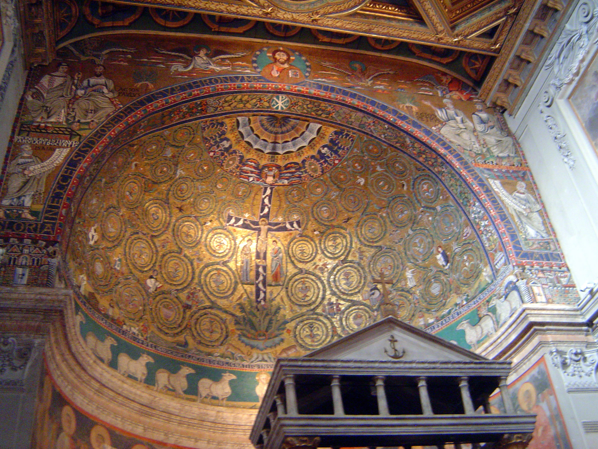 The apse has this unusual mosiac. What's unusual? Not Jerusalem and Bethlehem, which appear at the bottom of the flat outer face. Not the pr