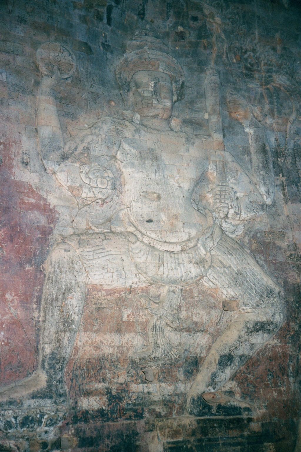 Vishnu crossing the ocean: one foot on a pedestal, the other on a lotus.