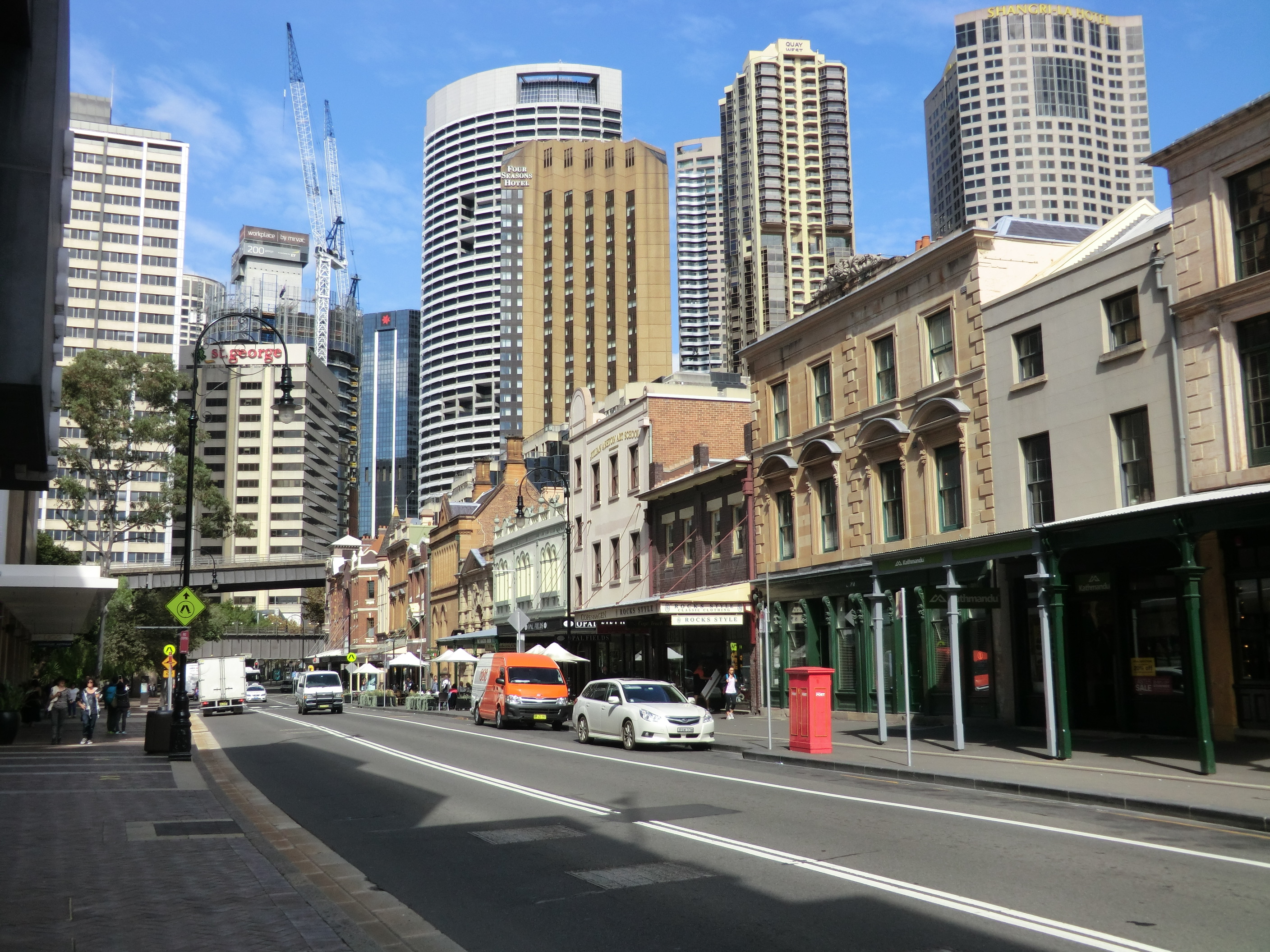 Here on George Street there's a juxtaposition of old and new. The old survives mostly as part of The Rocks, a tourist center, but it says so