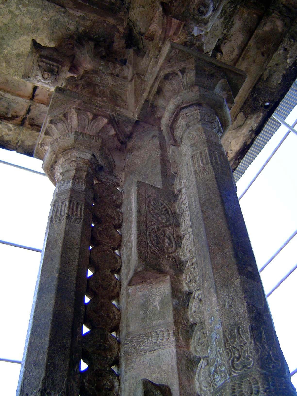 It's a tri-column monolith, one of two holding up the heavy stone-slab roof.