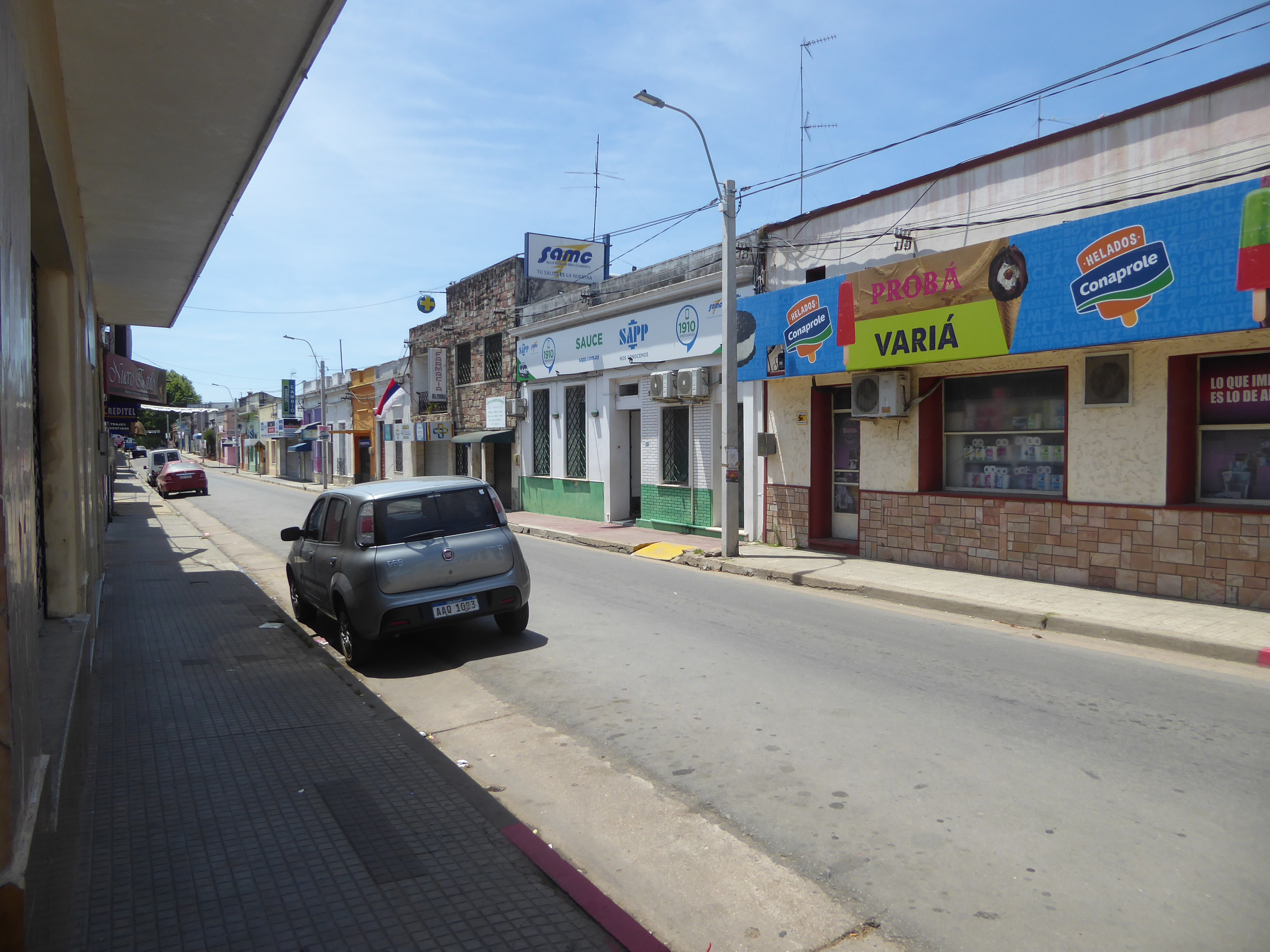 The surrounding shops are one-story affairs.