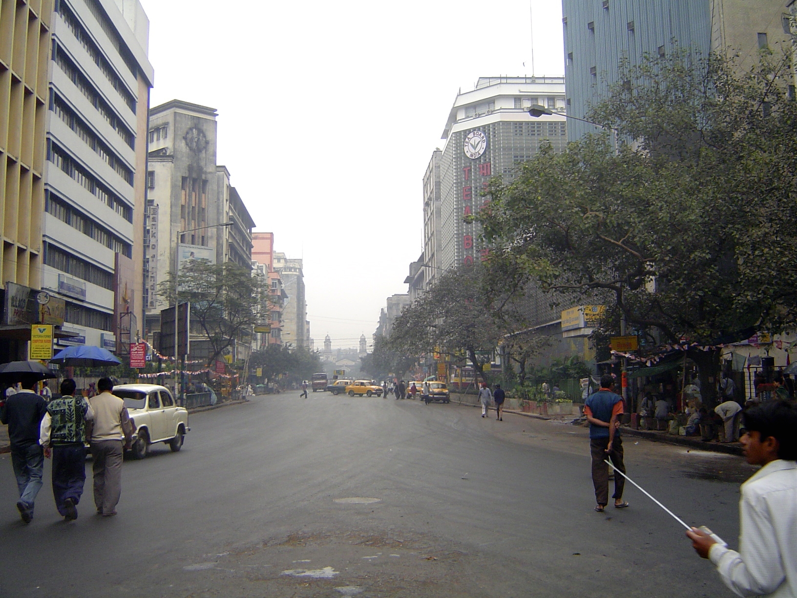 We'll circle back downstream from the bridge. Some of the streets are lined with buildings that are obviously post-1947. Calcutta isn't froz