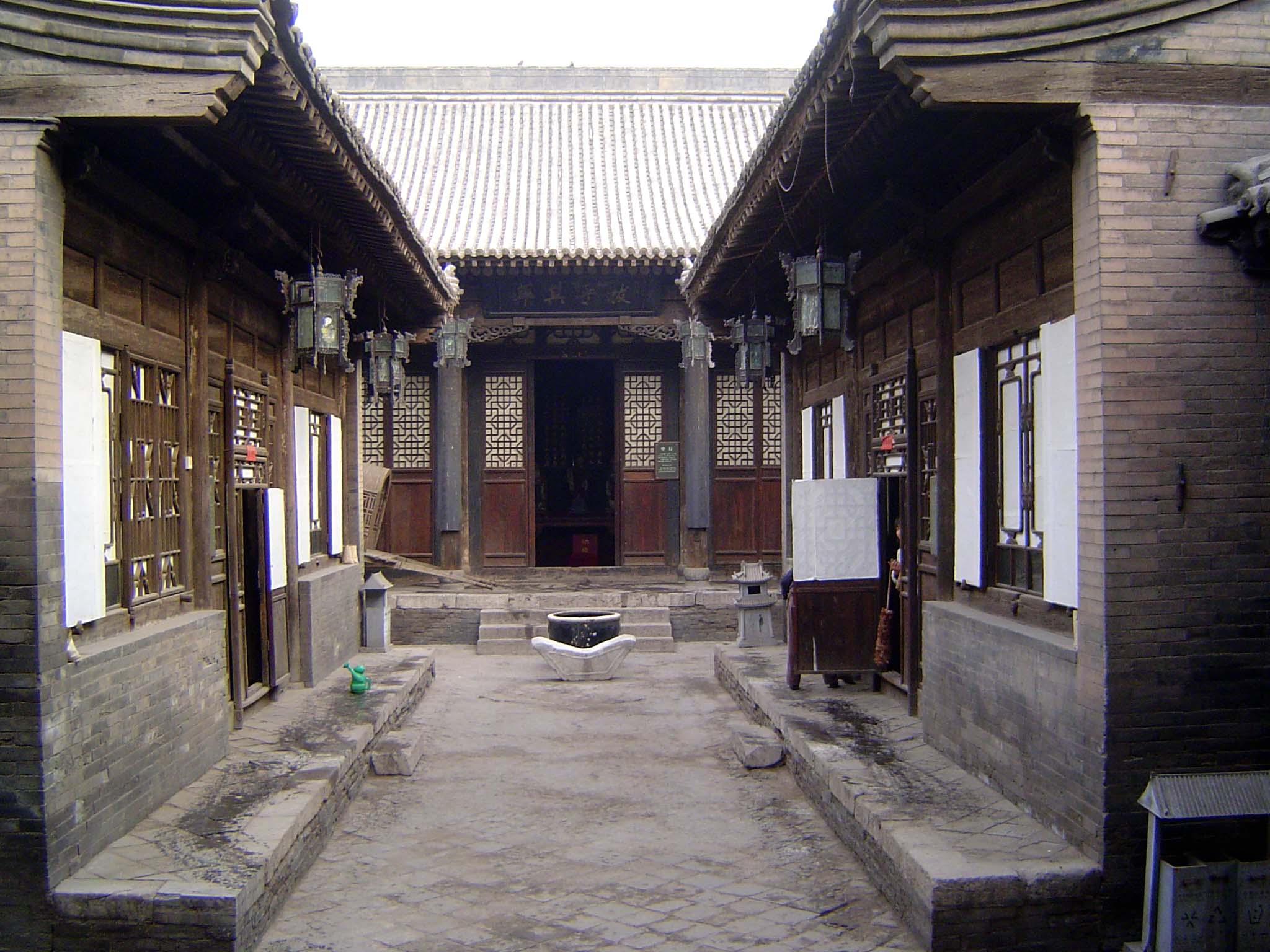 We're looking south to the hall on the south, a reception building. The view to the north is similar, except that the building at that end i