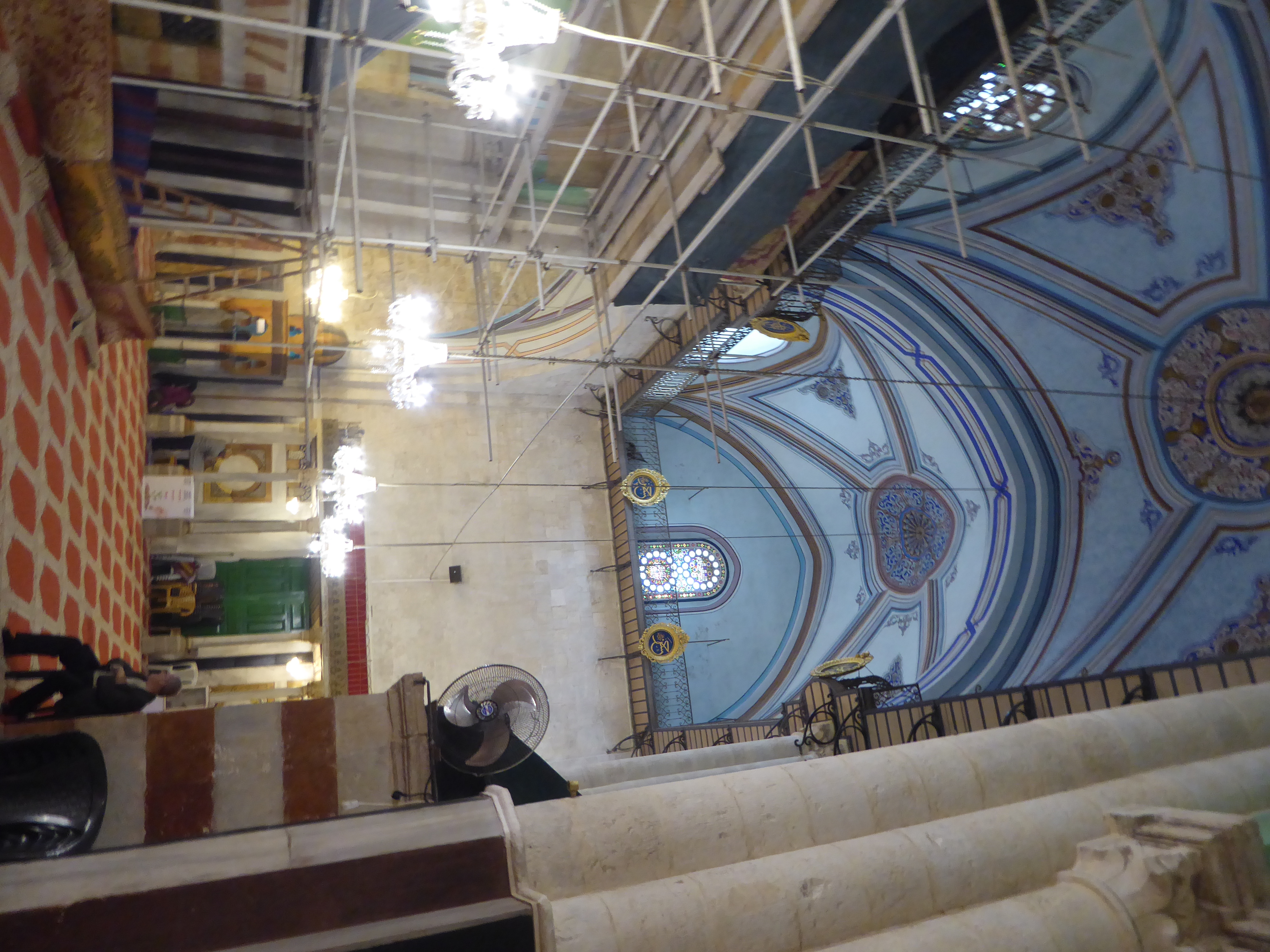 We're spun around 180 degrees. Abraham's cenotaph is on the other side of the wall. See that man scrutinizing it?
