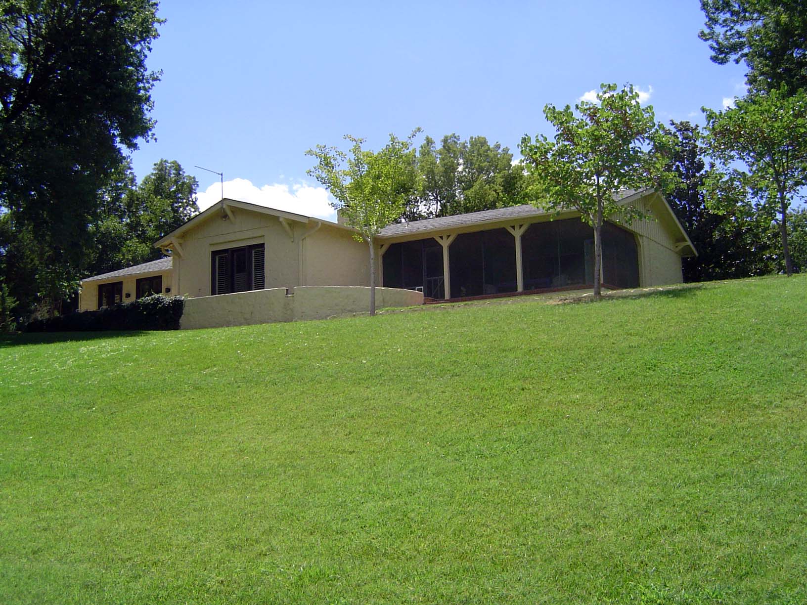 Here's the lakefront home at 161 Lake Aluma Drive, just next to the dam. It was built in 1922 as one of the first homes on the lake, and—as