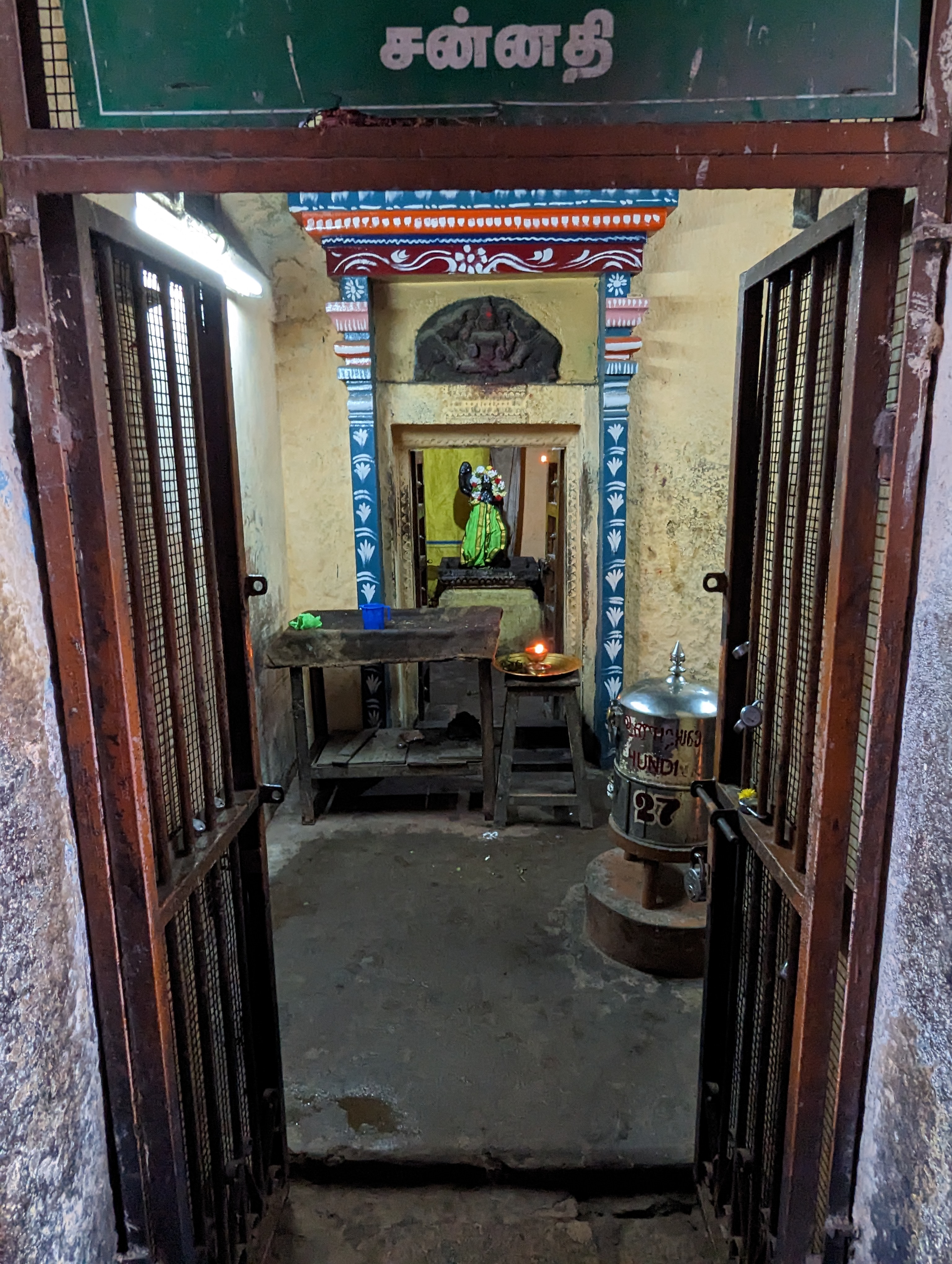 The center of the passage leading through a gopuram has vestibules or recessed entrances to stairs leading up into the tower; often, as in t