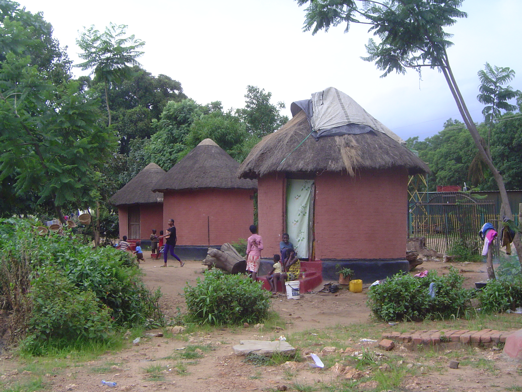 Personal servants were to be housed in a village of improved traditional huts. Most have since been destroyed, but several dozen survive in