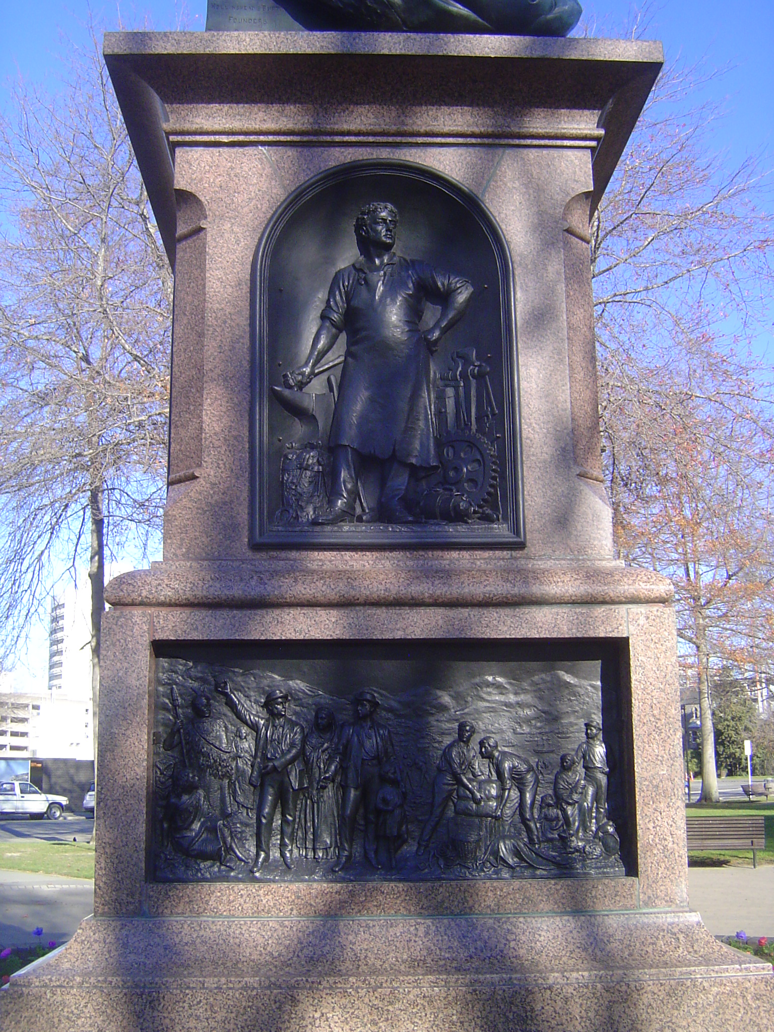 Perhaps the figures represent Edward Gibbon Wakefield and John Robert Godley. Wakefield was the man behind the New Zealand Company, which ha