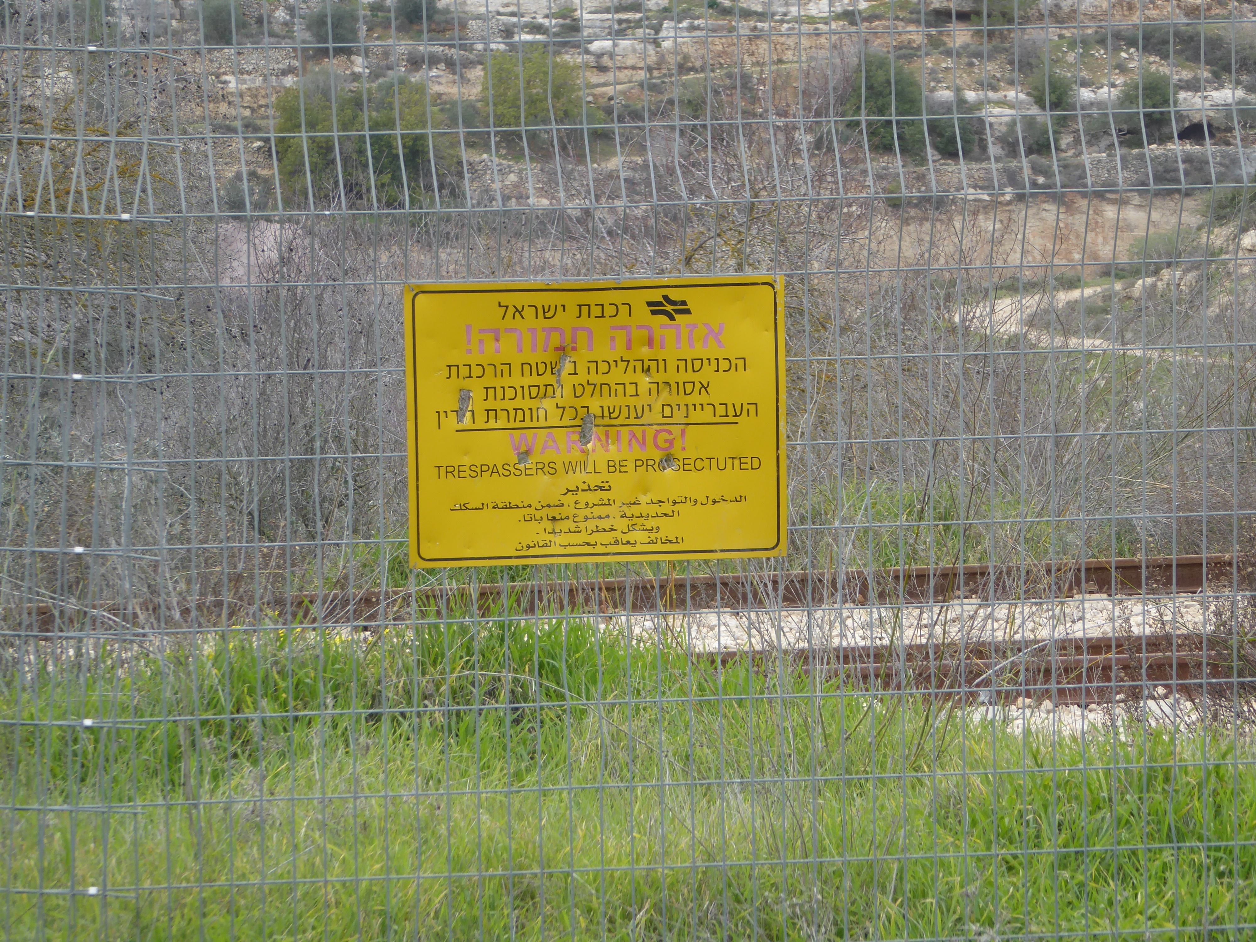 There are only modest fences, warning signs, and patrol vehicles on the Israeli side.