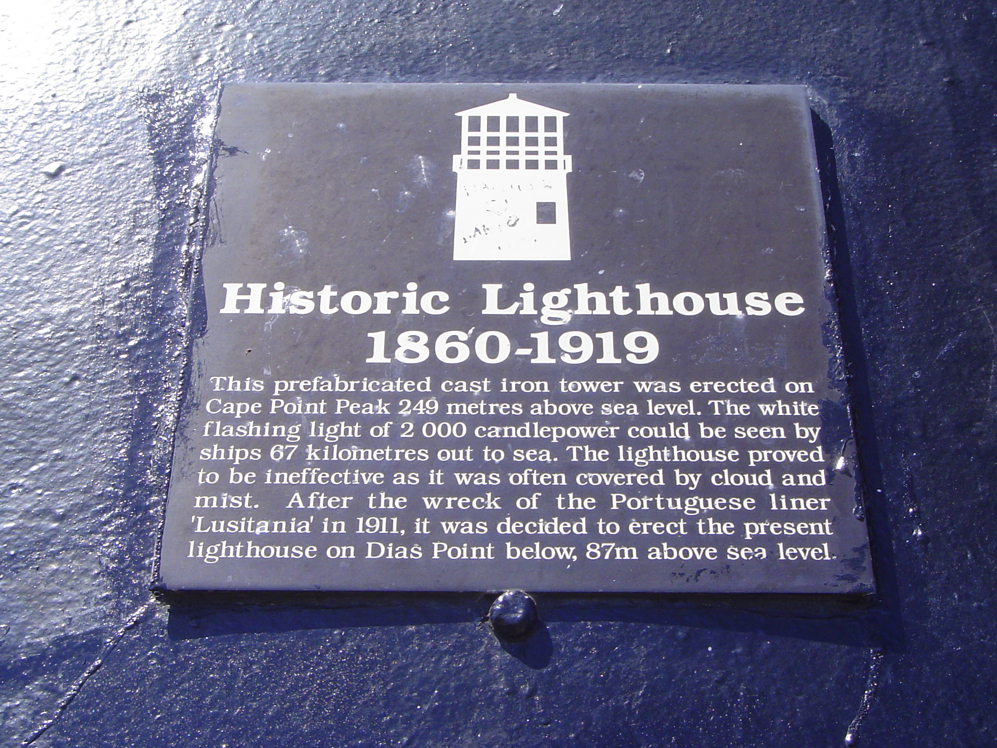 Sign on the cast-iron tower.