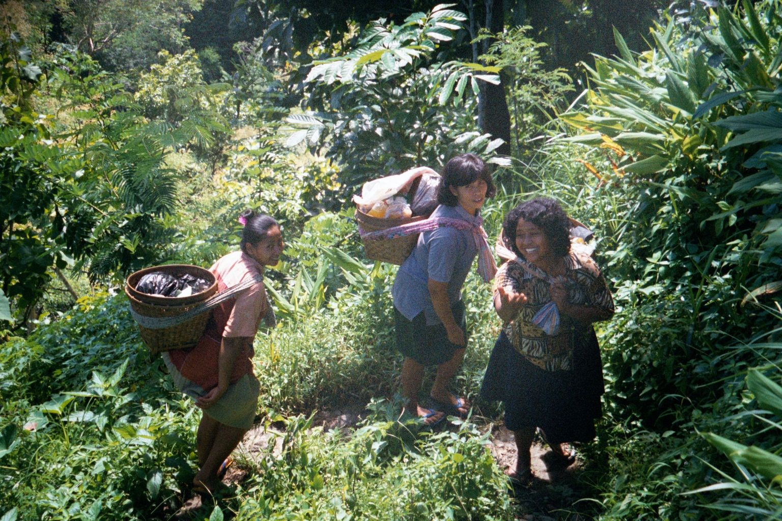People live up here. A few women come home with their shopping.