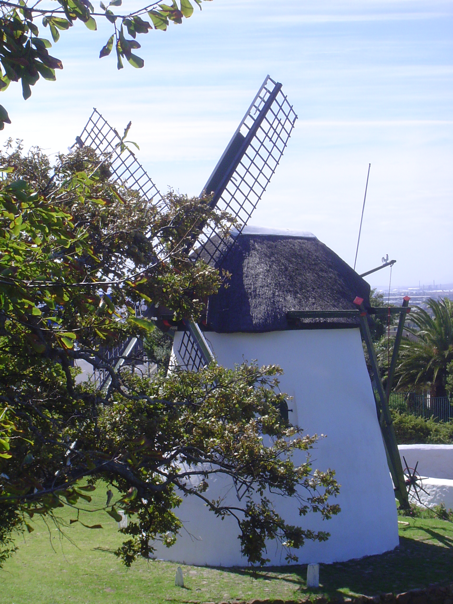 This is Mostert's Mill, half a mile downhill from the Rhodes Memorial. It was built in 1796 as the first private mill in the colony; before