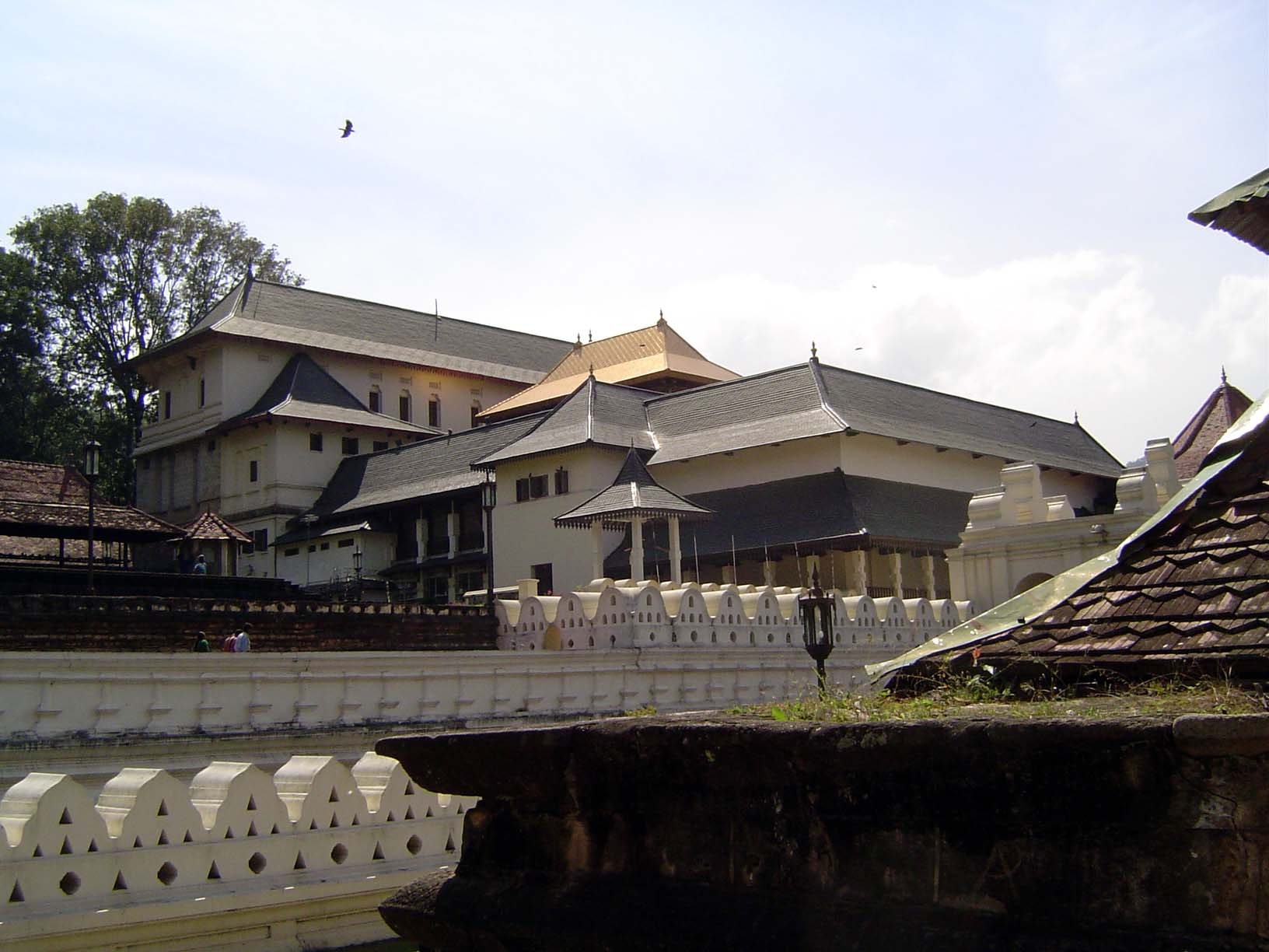 Another perspective, showing the golden-topped tooth temple, surrounded by 20th century additions.