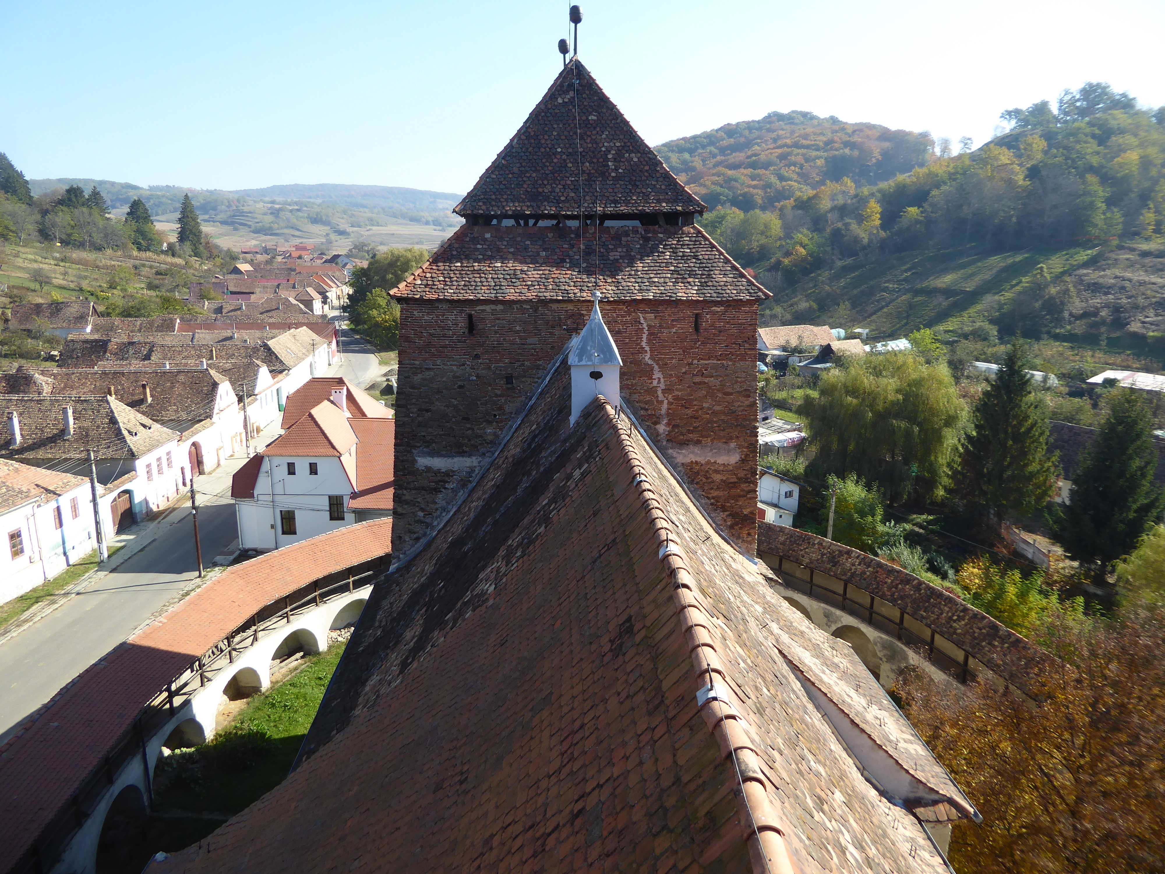 The view from the bell tower toward the fortress tower. The village street-pattern is T-shaped, with one main road following a creek and ano