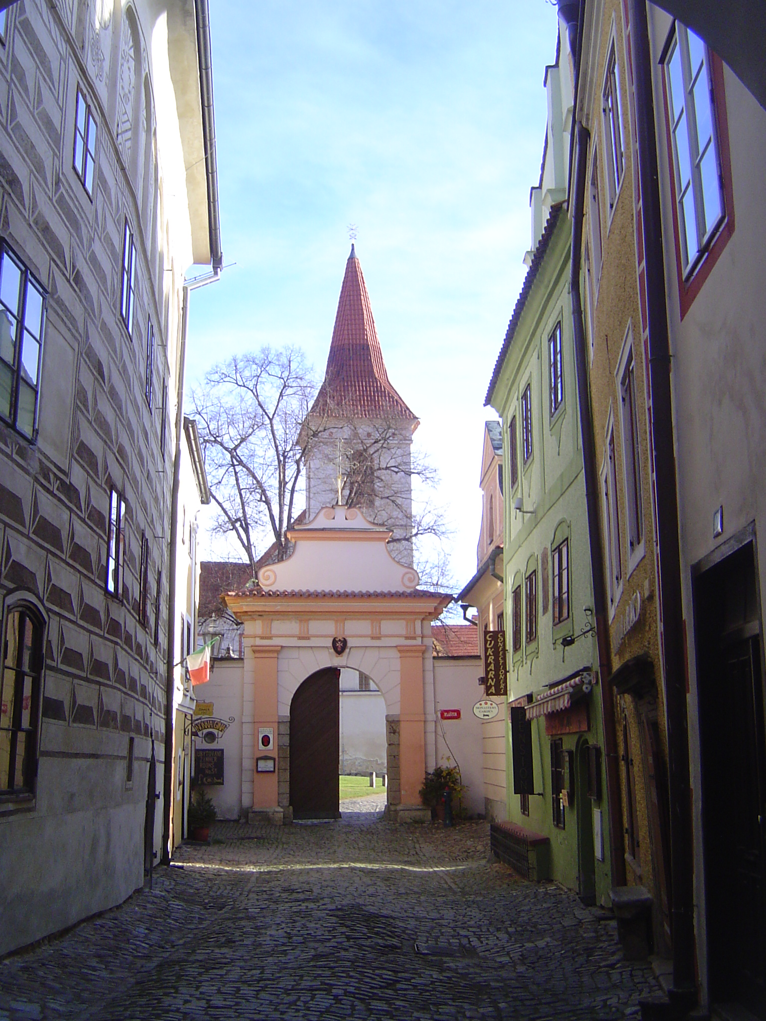 The gate here is gone, but just as a hint of what it looked like, here's the town's one surviving gate, the I Budejovica Gate, in Latran.