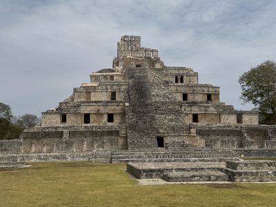 It's the palace or temple of five stories. Call me a barbarian, but I see kids playing peekaboo or hide-and-seek.