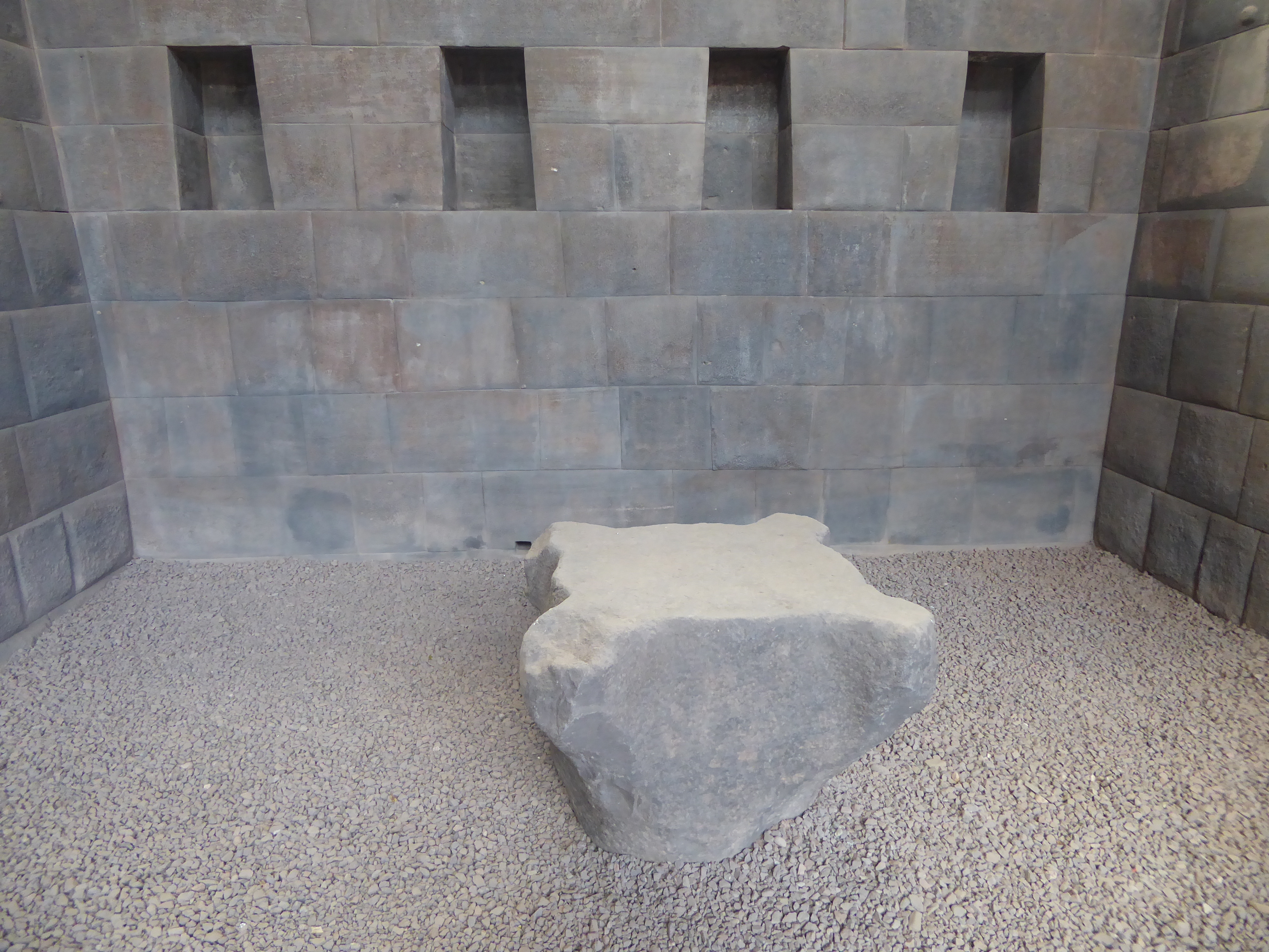 A few Inca alcoves survive around the cloister, and their stones are as perfect as an engineer might wish. The recesses served an unknown pu