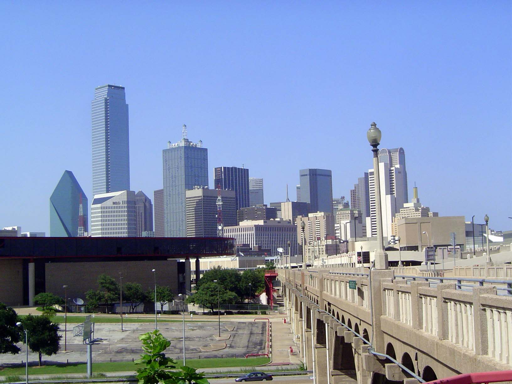 From the Commerce Street Viaduct, which crosses the river, the skyline is still dominated by the Bank of America, Renaissance, and JPMorgan