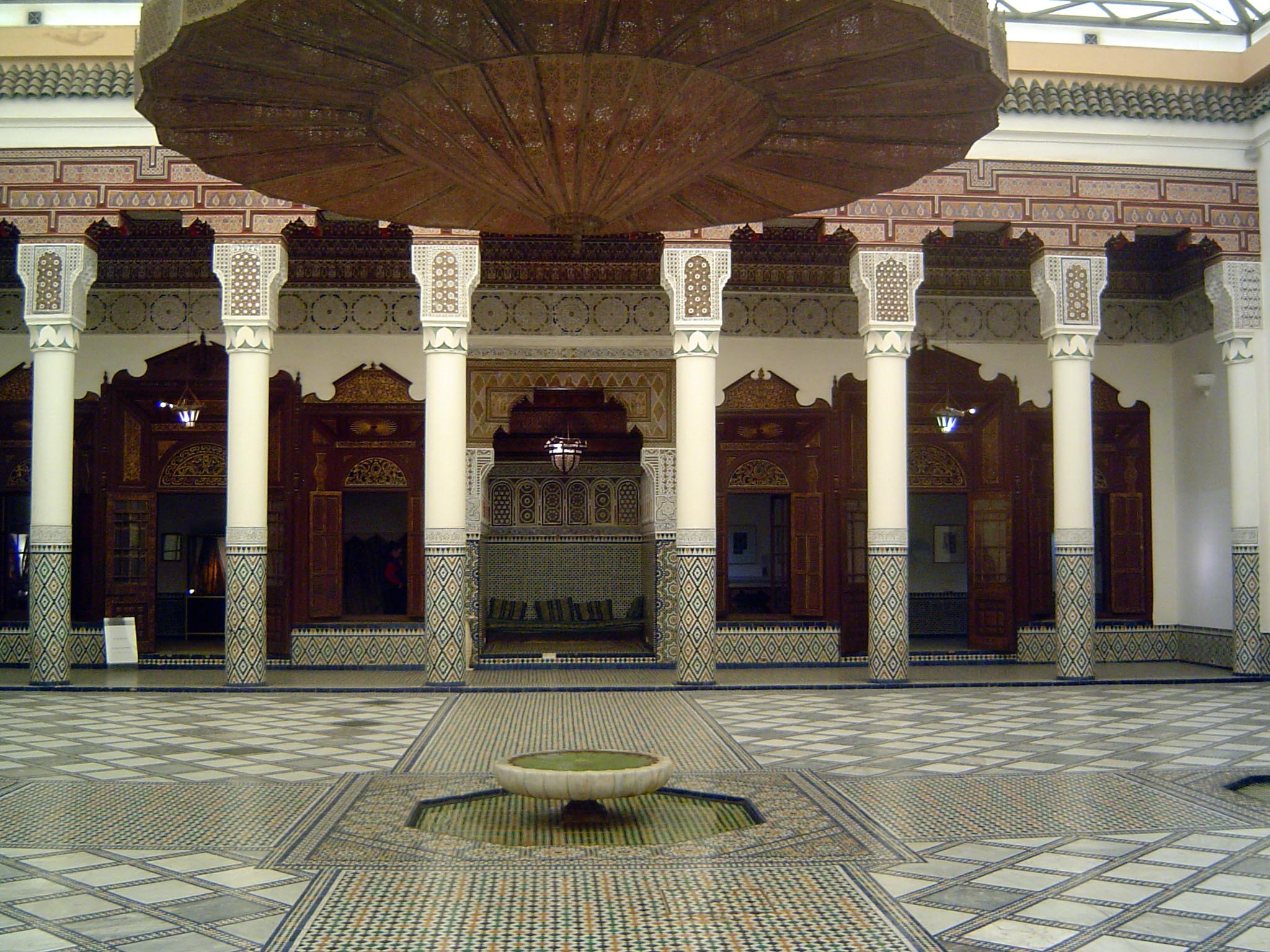 The same large courtyard with a view into a side room.