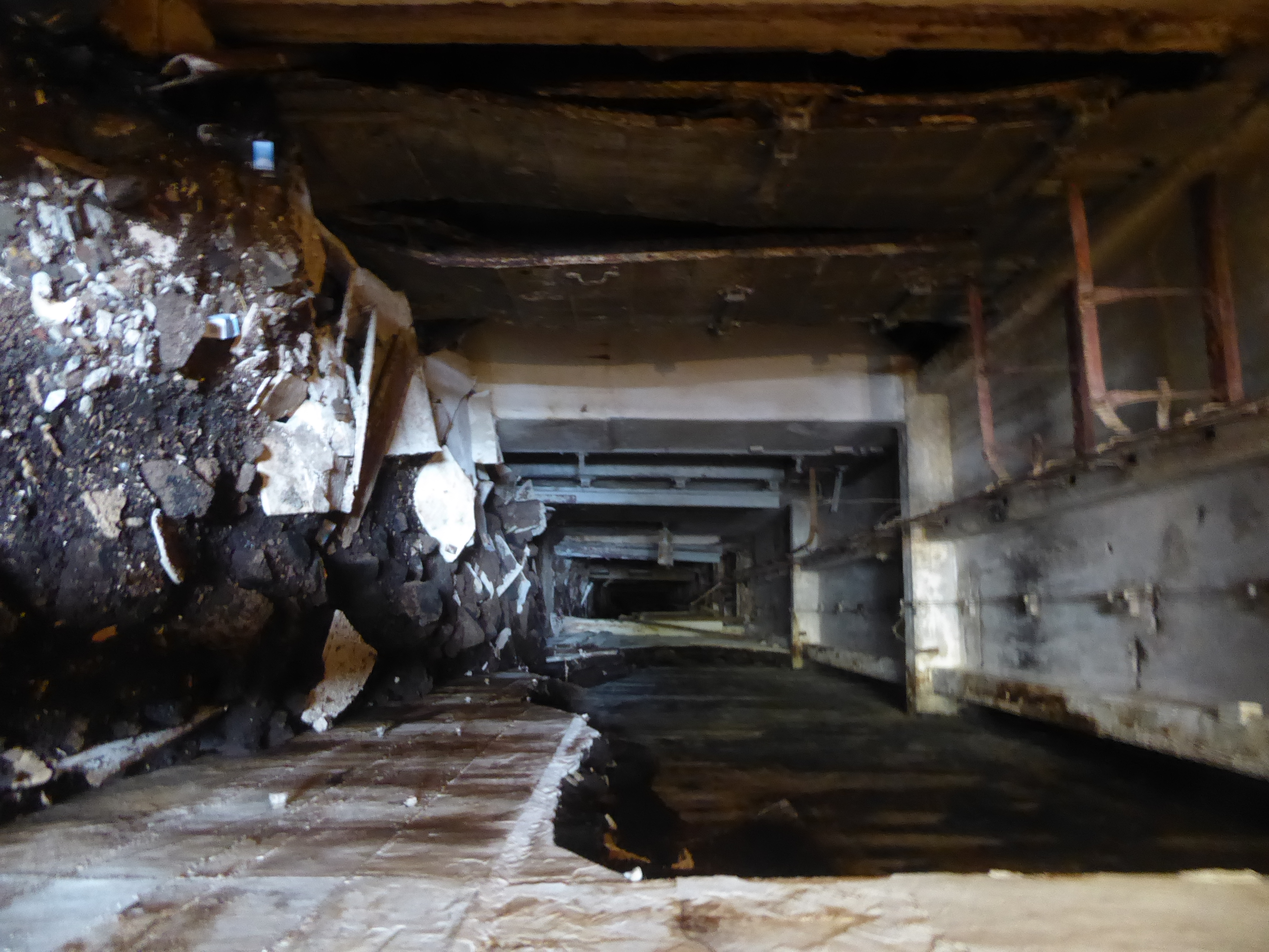 The interior of the refrigerator building is in rough shape. Here's the corridor leading to the refrigeration compartments, some for chilled