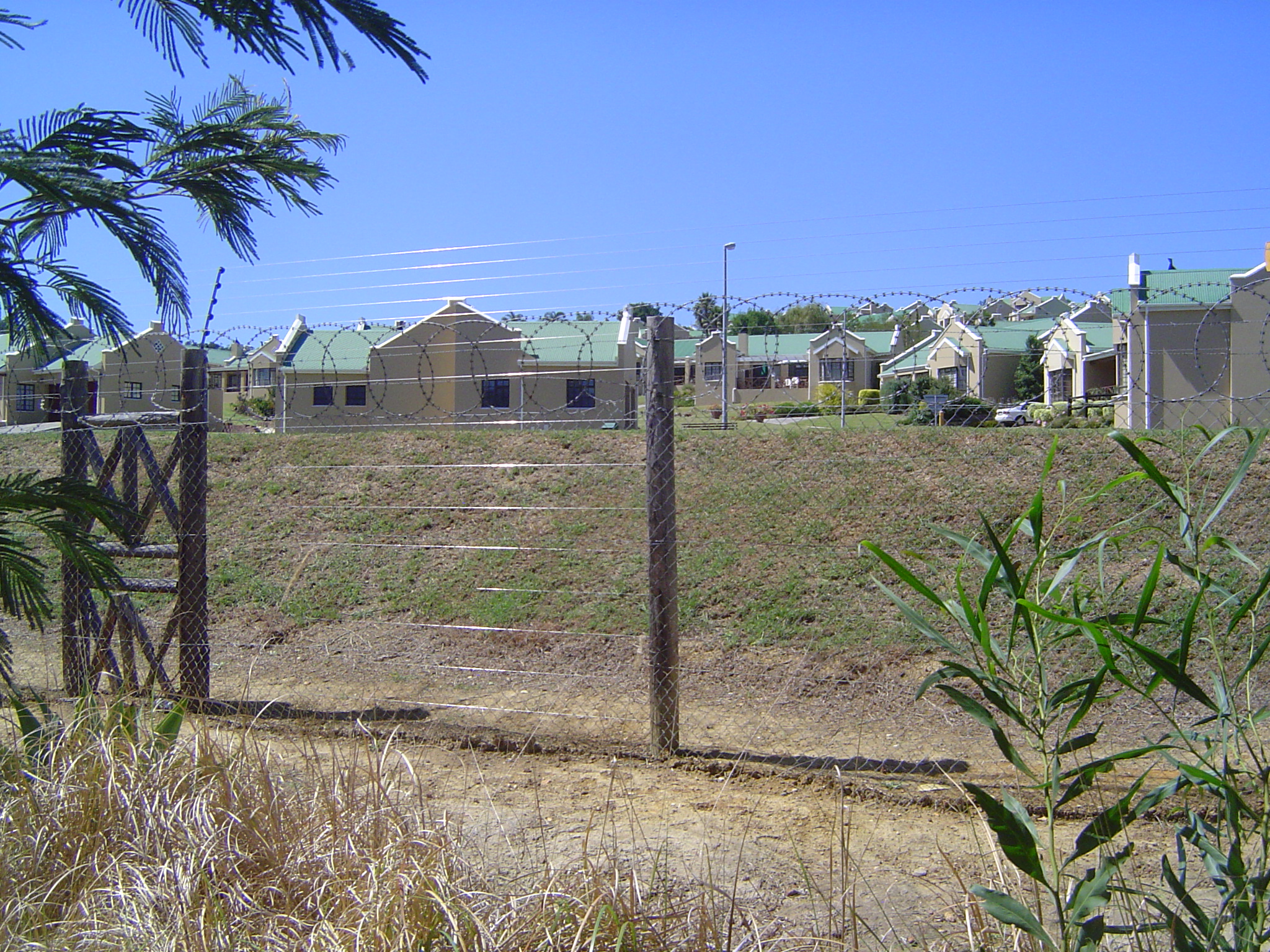 The result is Rotary Park, a retirement community with stalag-quality fencing.