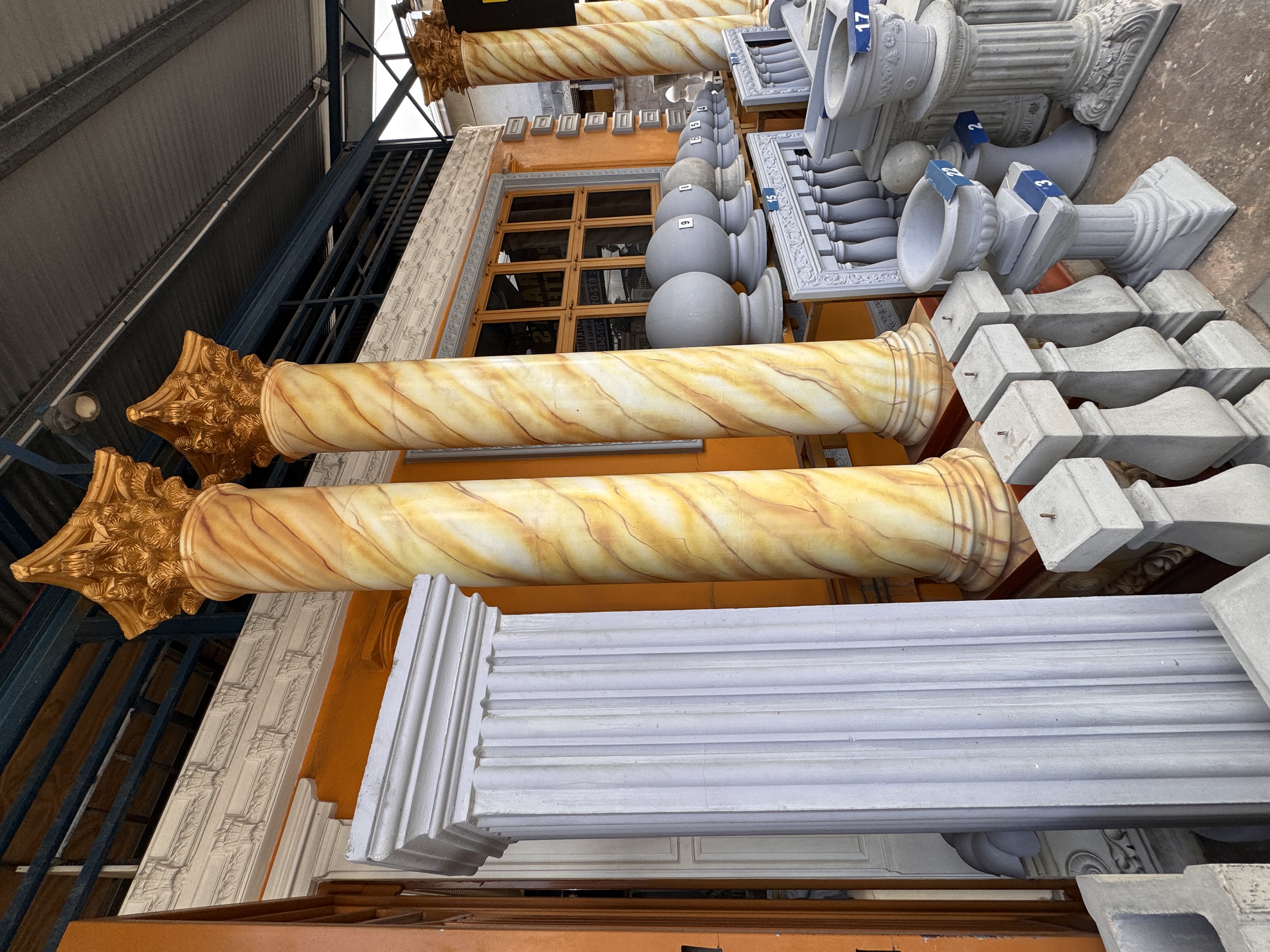 Corinthian capitals on marble columns.