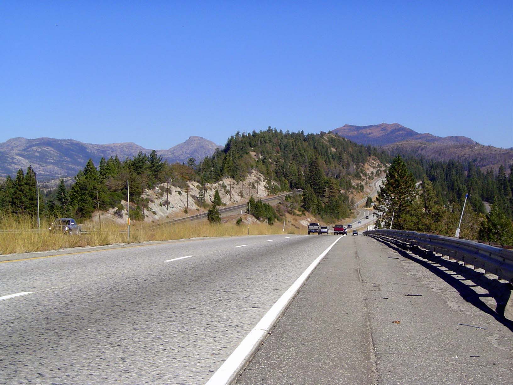 By Blue Canyon we've moved out of the flat-topped ridges of the mid-Sierra into more rugged, glaciated country. The winters, and the trucks