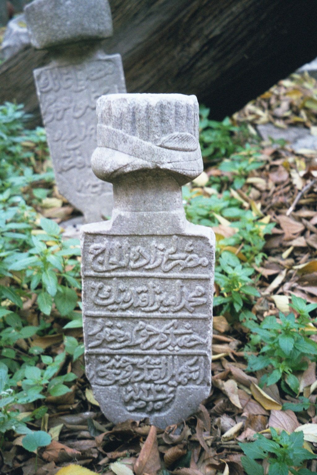 A third. It's almost as if the deceased was still reporting for duty. Sadly, very few Turks today can read what's written here because Atatu