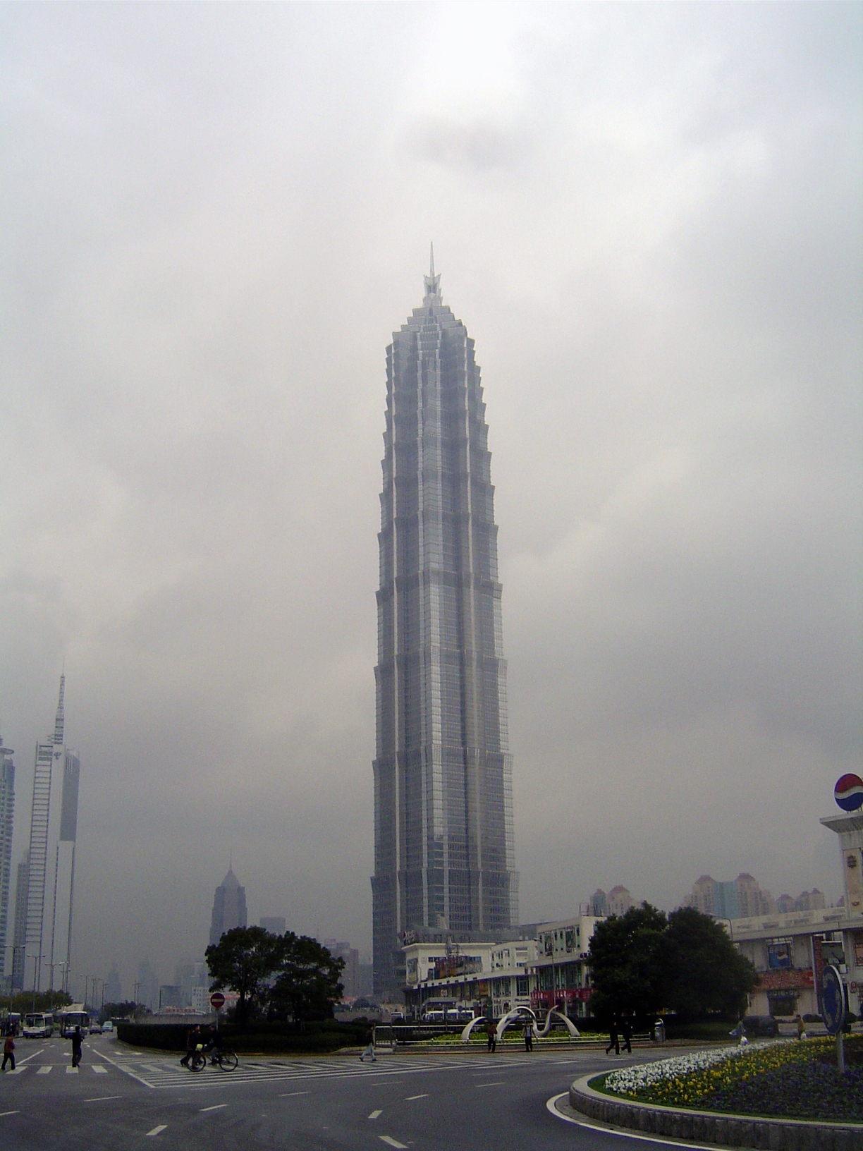 The heavenly mists clear to reveal a structure whose setbacks are supposed to echo a pagoda.
