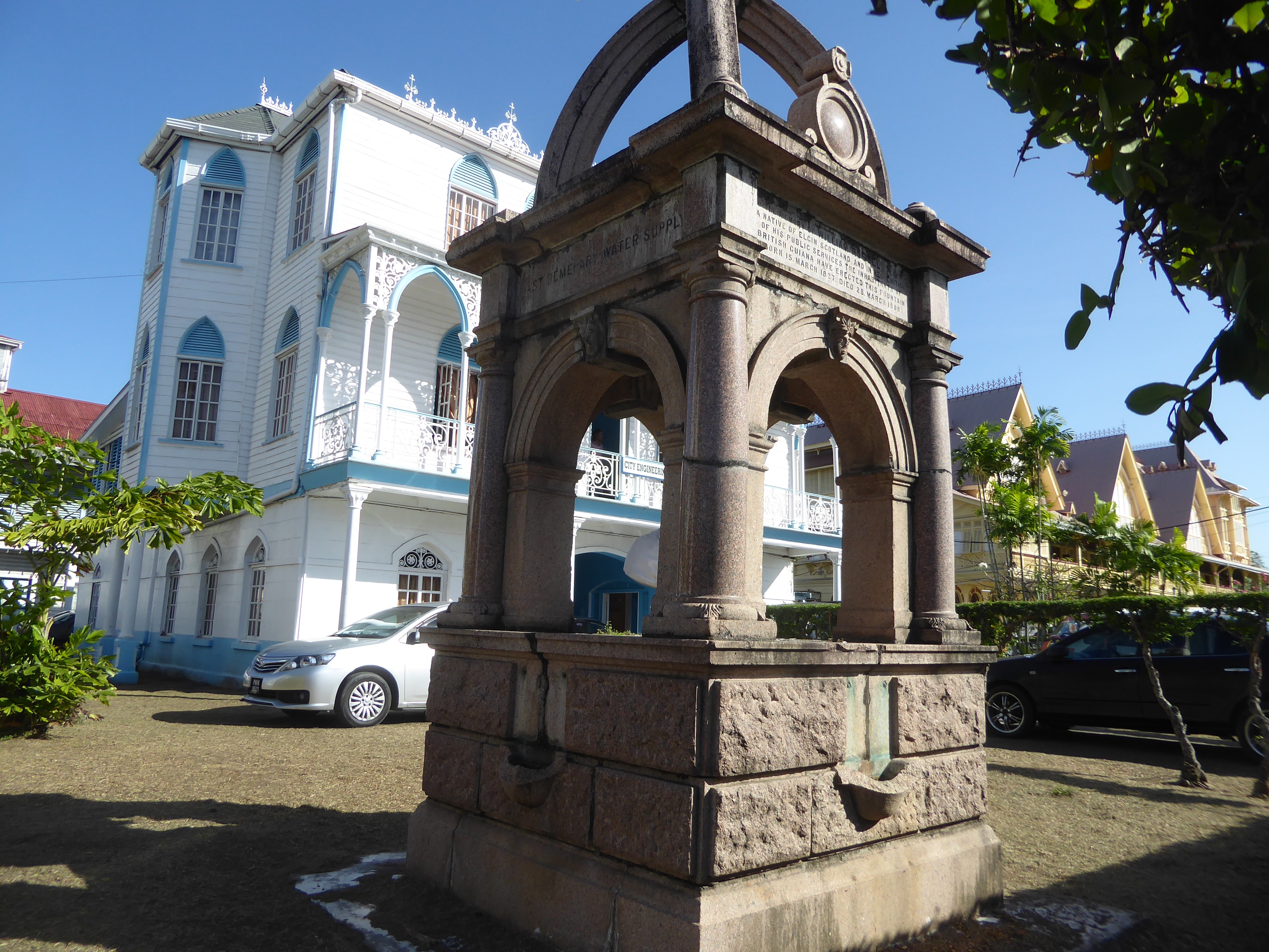 In front of the City Engineering Department is a kiosk reading: "In memory of William Russell, a native of Elgin, Scotland and in recognitio