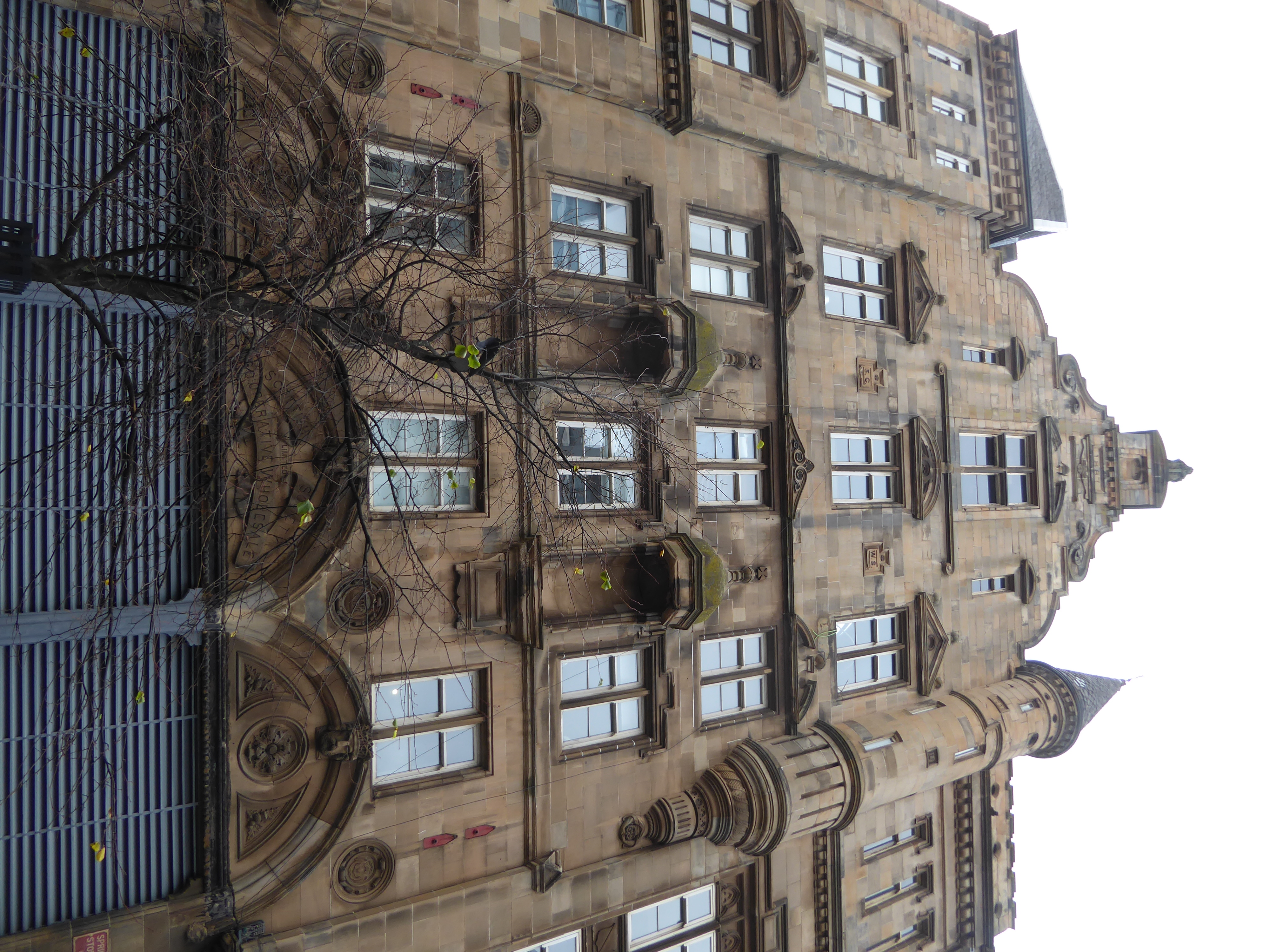 This is the oldest part of the building, from the 1880s and Franco-Flemish. Williamson says that the top floor contains a meeting hall. You