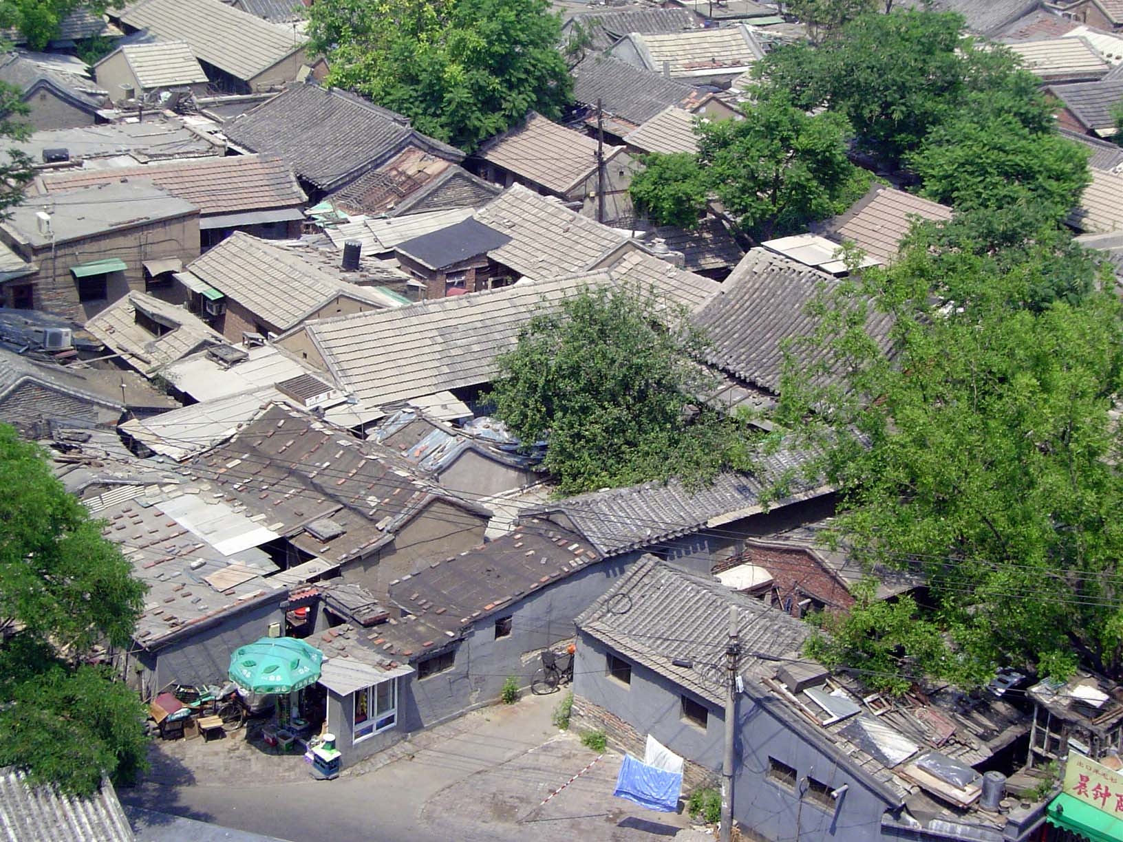 But the view in other directions is over barbarized courtyard houses. Notice the tree that's boxed in. You can make out the main hall on the