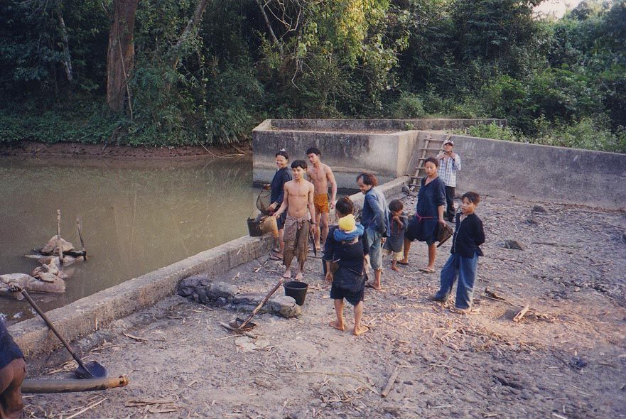 A fuller view, showing villagers about to fish.