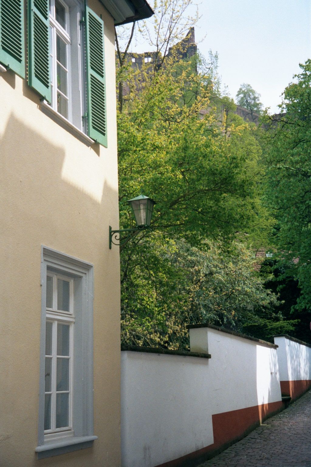 A lane winds down the hill from the castle.
