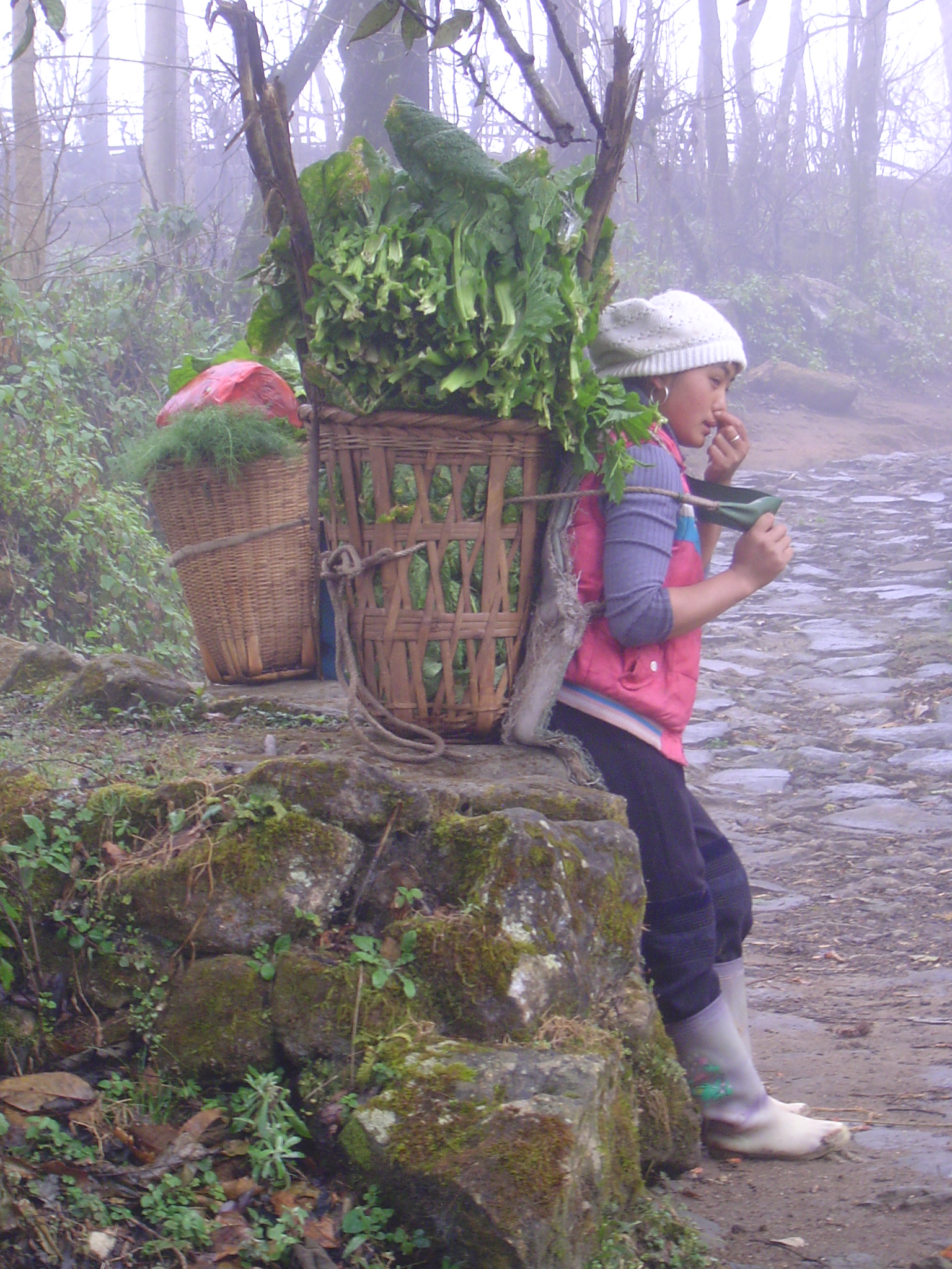 Catching a breath on the way uphill to the market.